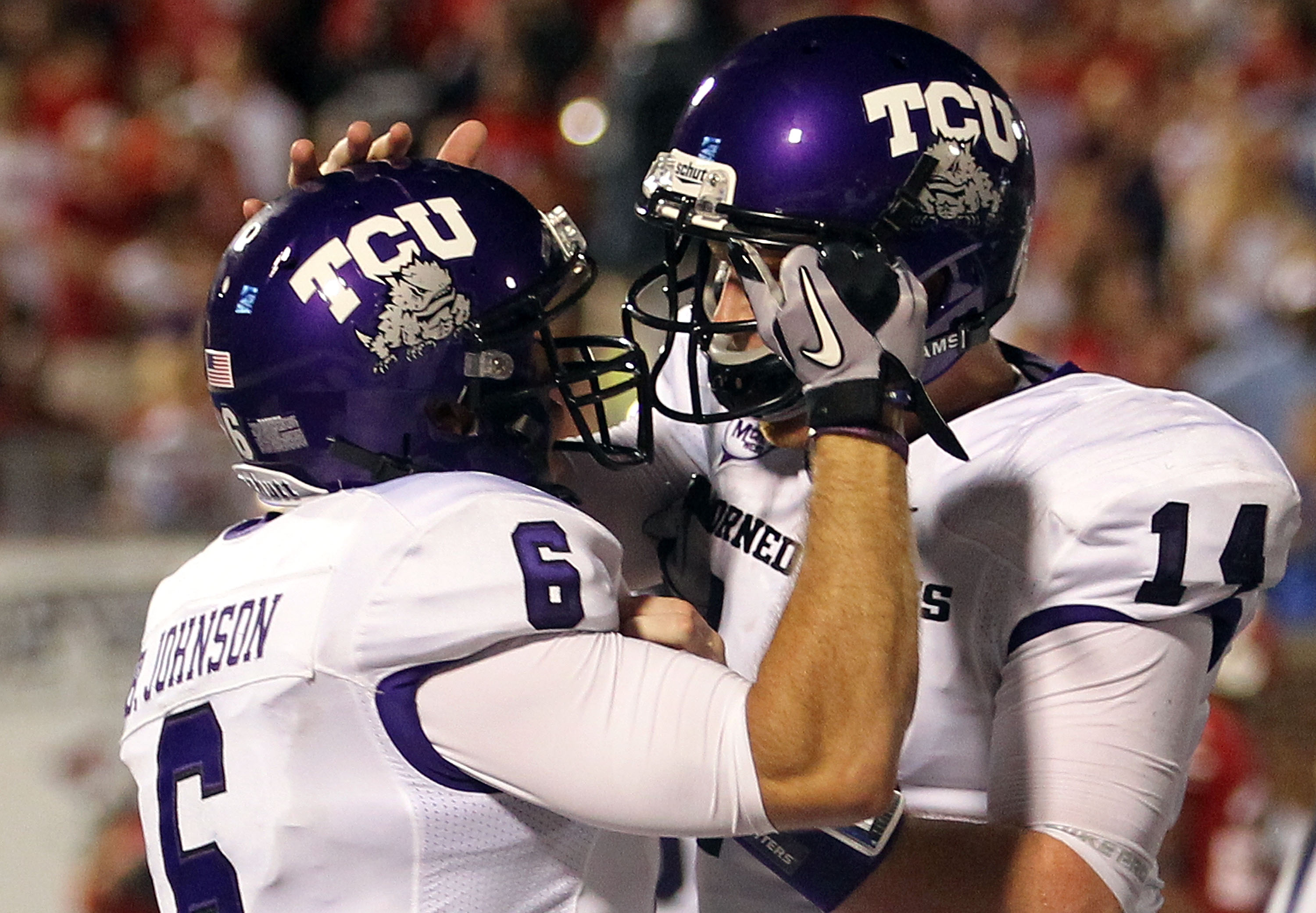 DALLAS - SEPTEMBER 24: Wide receiver Bart Johnson #6 of the TCU Horned Frogs celebrates a touchdown with Andy Dalton #14 in the third quarter against the SMU Mustangs at Gerald J. Ford Stadium on September 24, 2010 in Dallas, Texas. (Photo by Ronald Mar
