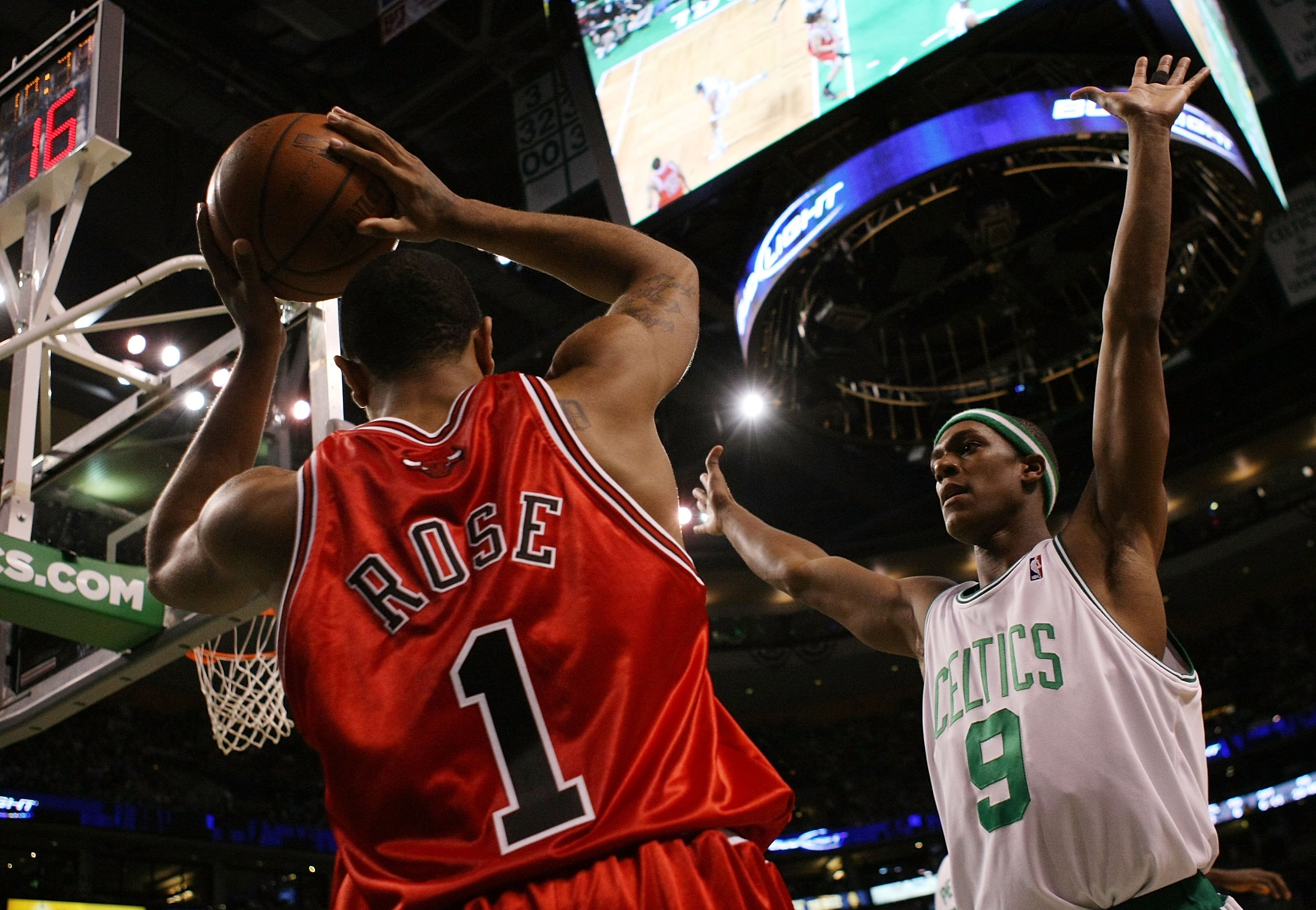 BOSTON - MAY 02:  Rajon Rondo #9 of the Boston Celtics tries to keep Derrick Rose #1 of the Chicago Bulls from passing the ball in bounds in Game Seven of the Eastern Conference Quarterfinals during the 2009 NBA Playoffs at TD Banknorth Garden on May 2, 2