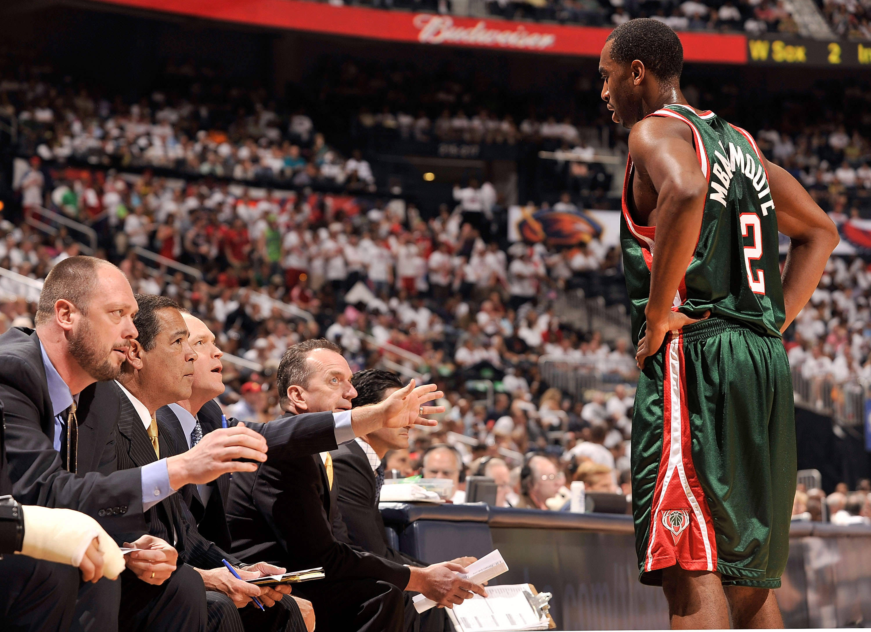 ATLANTA - APRIL 17: Luc Richard Mbah a Moute #12 of the Milwaukee Bucks confers with the coaching staff during a 102-92 loss to the Atlanta Hawks during Game One of the Eastern Conference Quarterfinals of the 2010 NBA Playoffs at Philips Arena on April 1