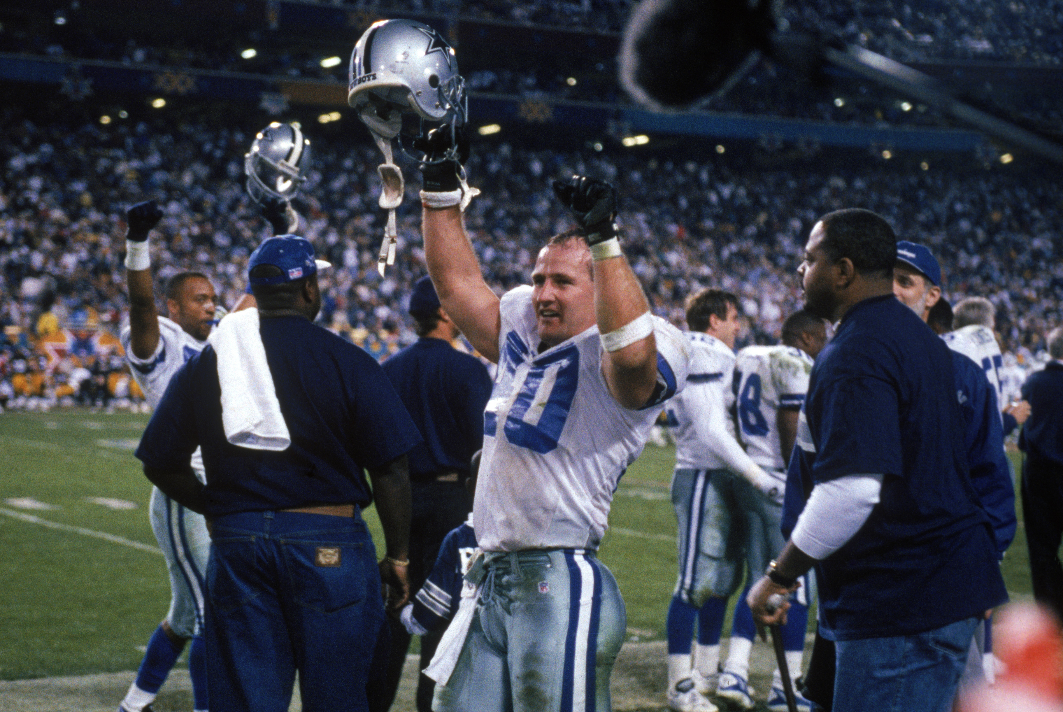 TEMPE, AZ - JANUARY 28:  Safety Bill Bates #40 of the Dallas Cowboys celebrates on the sidelines during Super Bowl XXX against the Pittsburgh Steelers at Sun Devil Stadium on January 28, 1996 in Tempe, Arizona.  The Cowboys won 27-17.  (Photo by George Ro