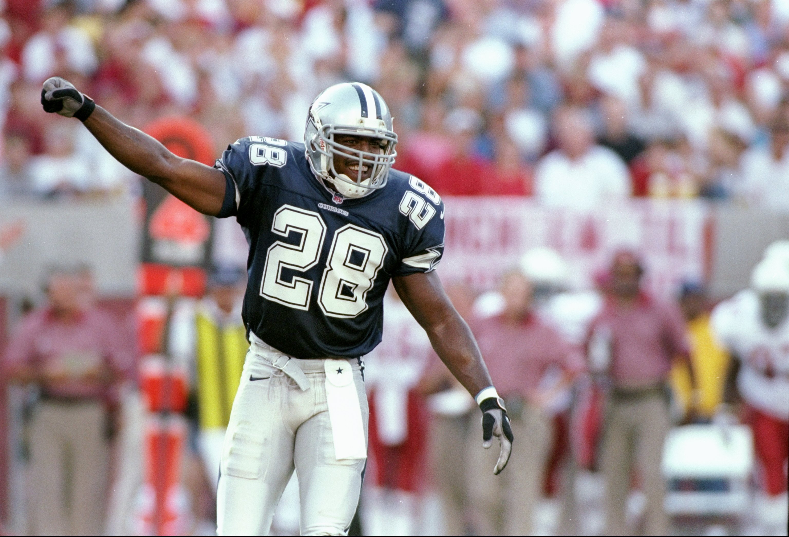 7 Sep 1997:  Defensive back Darren Woodson of the Dallas Cowboys celebrates during a game against the Arizona Cardinals at Sun Devil Stadium in Tempe, Arizona.  The Cardinals won the game, 25-22. Mandatory Credit: Jed Jacobsohn  /Allsport