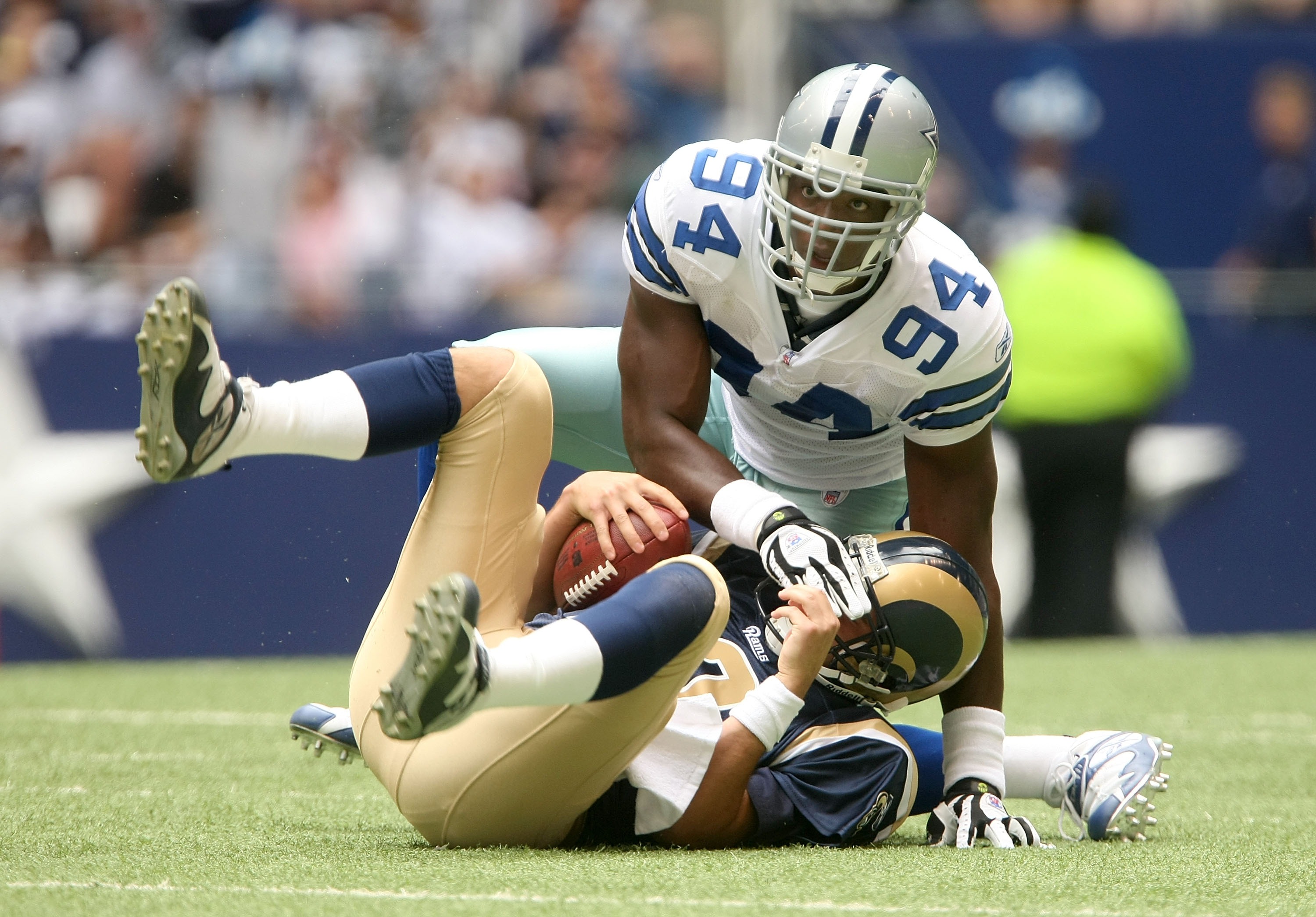 DALLAS - SEPTEMBER 30:  Linebacker DeMarcus Ware #94 of the Dallas Cowboys sacks quarterback Marc Bulger #10 of the St. Louis Rams at Texas Stadium September 30, 2007 in Irving, Texas. The Cowboys won 35-7.  (Photo by Stephen Dunn/Getty Images)