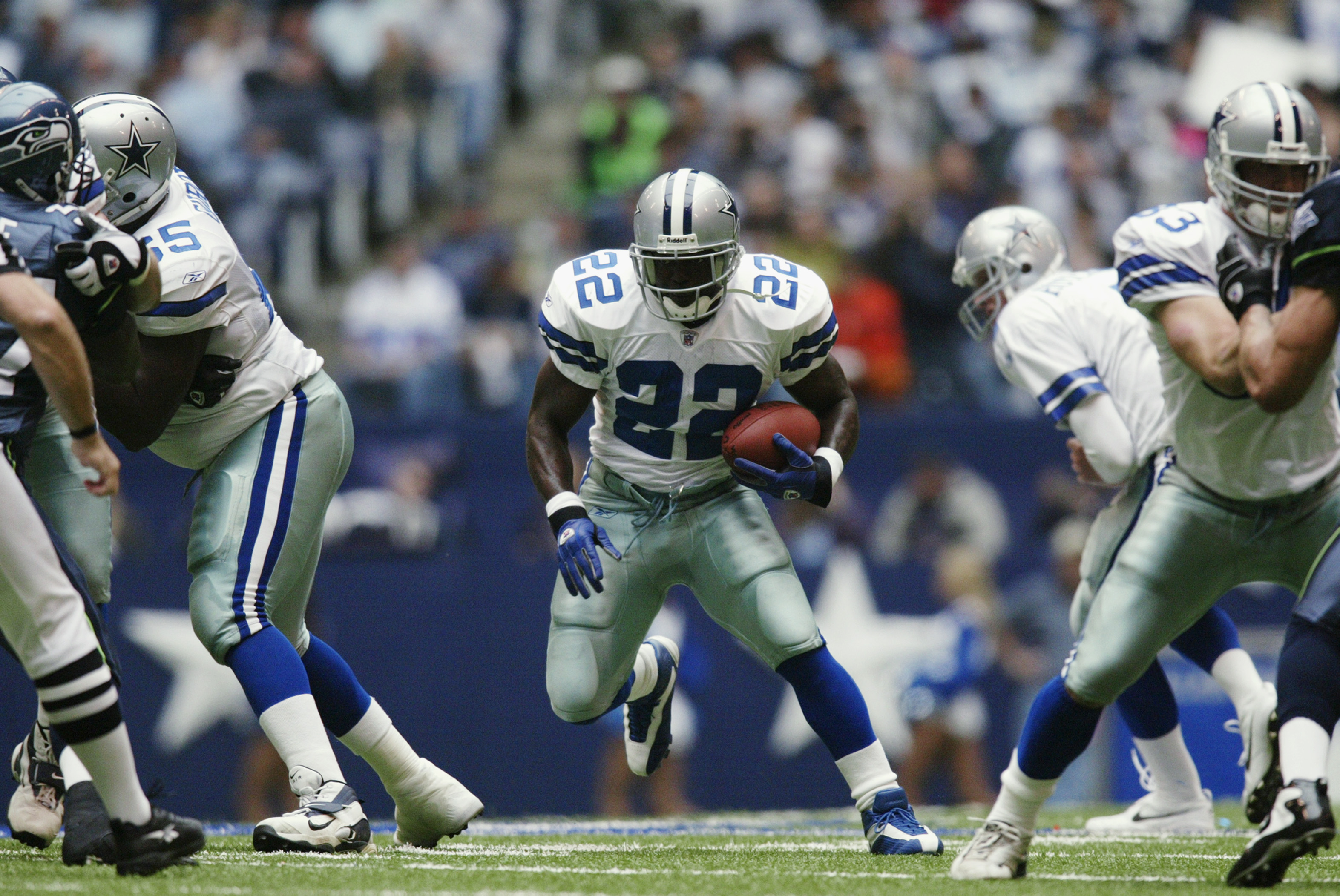 IRVING, TX - OCTOBER 27:   Running Back Emmitt Smith #22 of the Dallas Cowboys advances the ball during the NFL game against the Seattle Seahawks at Texas Stadium on October 27, 2002 in Irving, Texas. The Seahawks defeated the Cowboys 17-14. (Photo by Ron