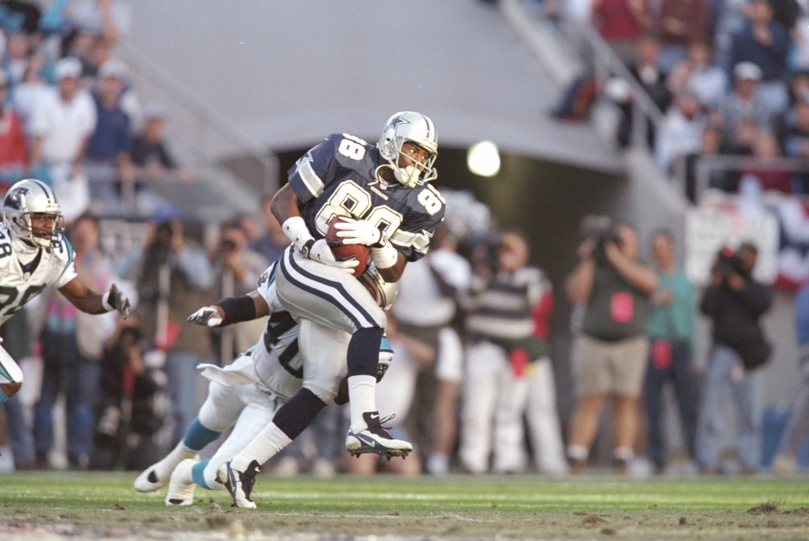 5 Jan 1997:  Wide receiver Michael Irvin of the Dallas Cowboys moves the ball during a playoff game against the Carolina Panthers at Ericsson Stadium in Charlotte, North Carolina.  The Panthers won the game, 26-17. Mandatory Credit: Andy Lyons  /Allsport