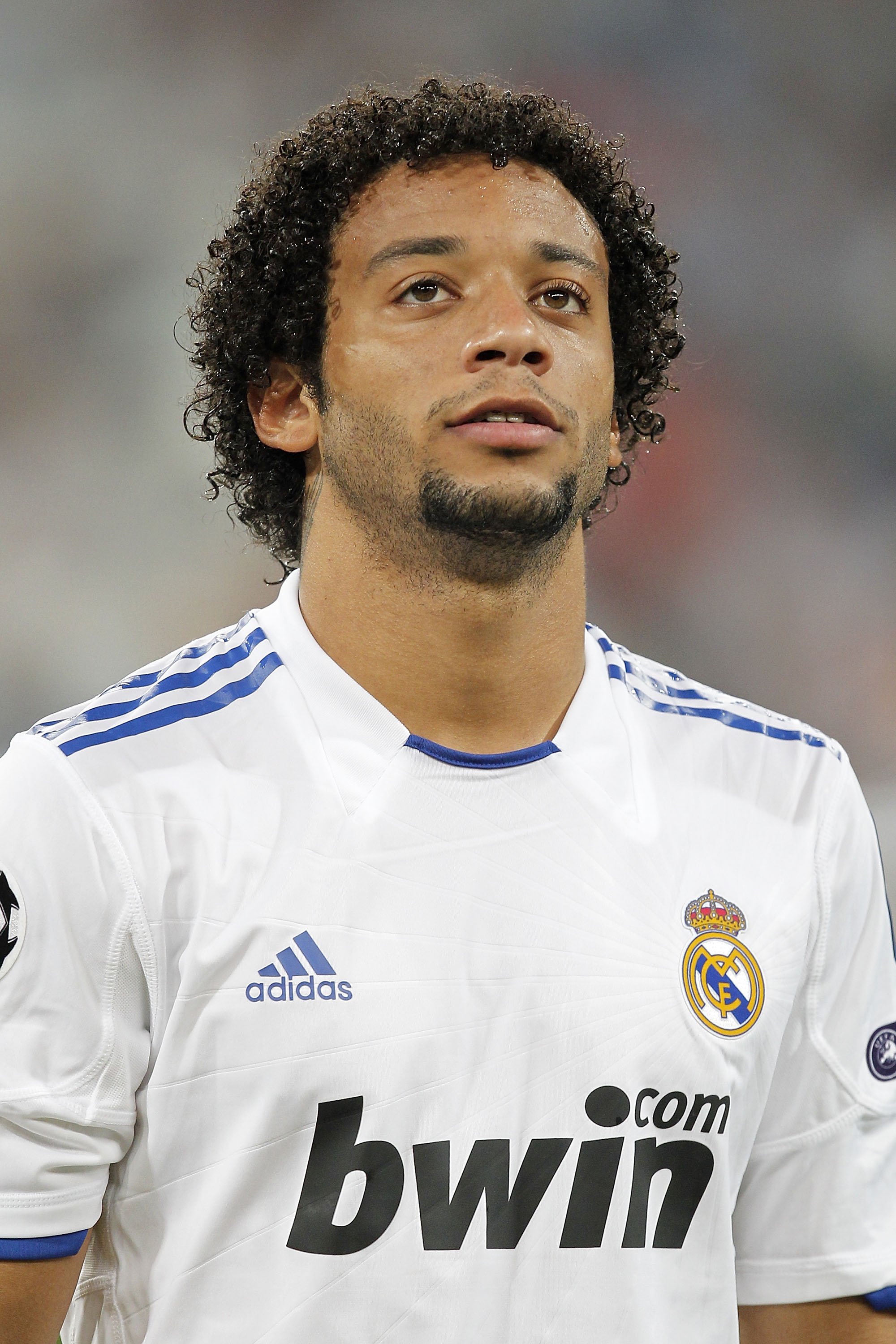 MADRID, SPAIN - SEPTEMBER 15:  Marcelo Vieira of Real Madrid watches on prior to the start of the UEFA Champions League group G match between Real Madrid and AFC Ajax at Estadio Santiago Bernabeu on September 15, 2010 in Madrid, Spain.  (Photo by Angel Ma