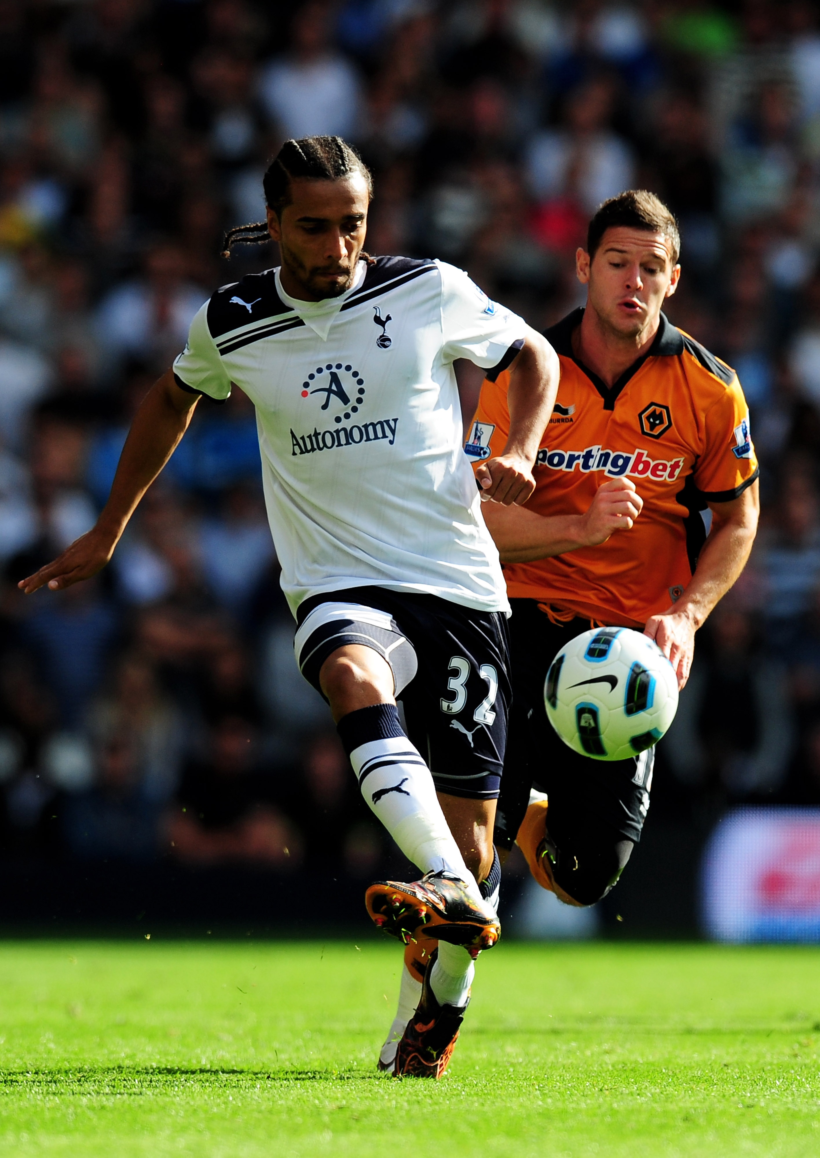 LONDON, ENGLAND - SEPTEMBER 18: Benoit Assou-Ekotto of Spurs passes the ball during the Barclays Premier League match between Tottenham Hotspur and Wolverhampton Wanderers at White Hart Lane on September 18, 2010 in London, England. (Photo by Mike Hewit