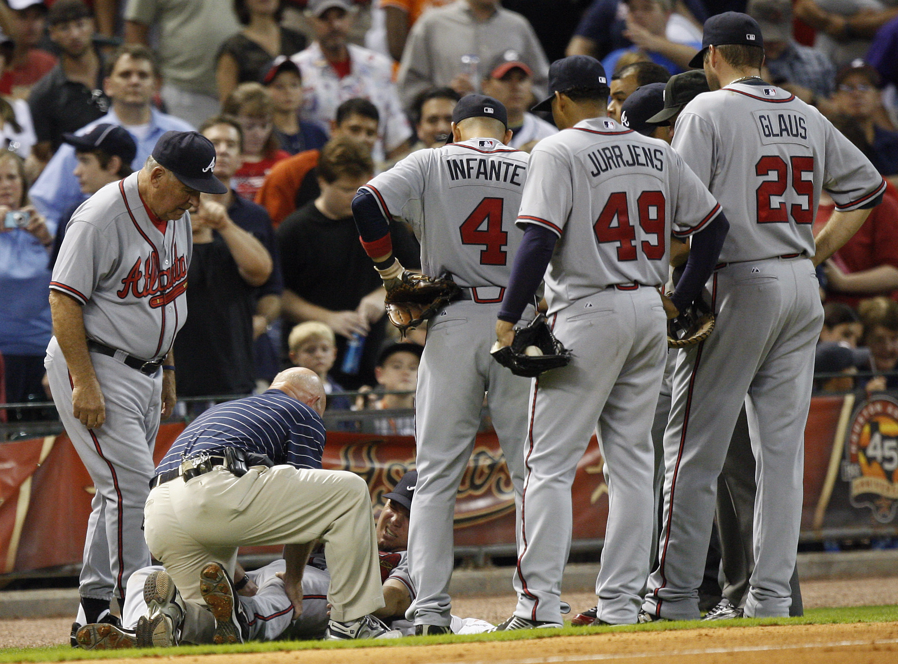 Atlanta Braves infielder Chipper Jones, left, jokes with former