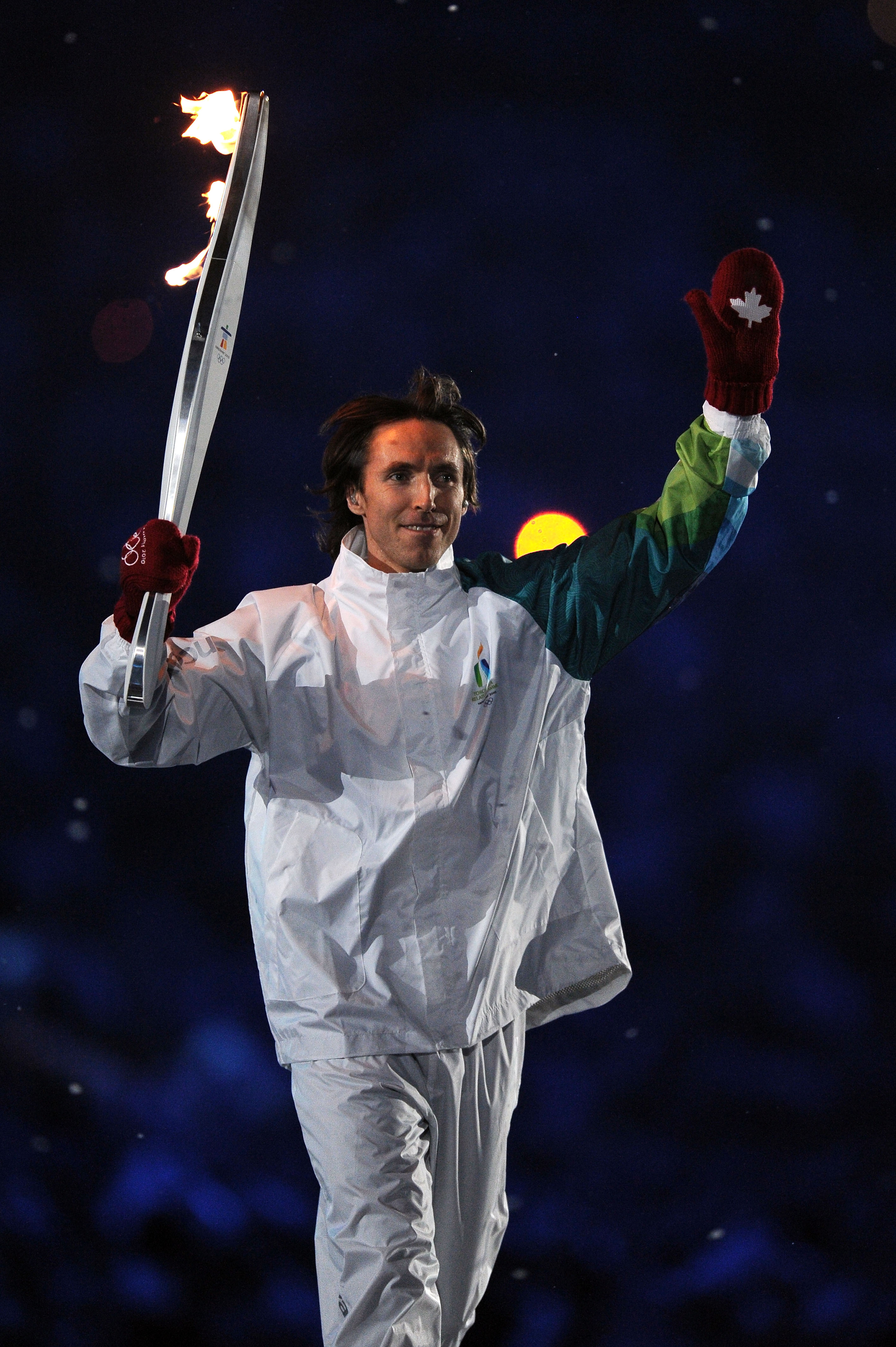 VANCOUVER, BC - FEBRUARY 12:  Steve Nash carries the Olympic flame during the Opening Ceremony of the 2010 Vancouver Winter Olympics at BC Place on February 12, 2010 in Vancouver, Canada.  (Photo by Jasper Juinen/Getty Images)