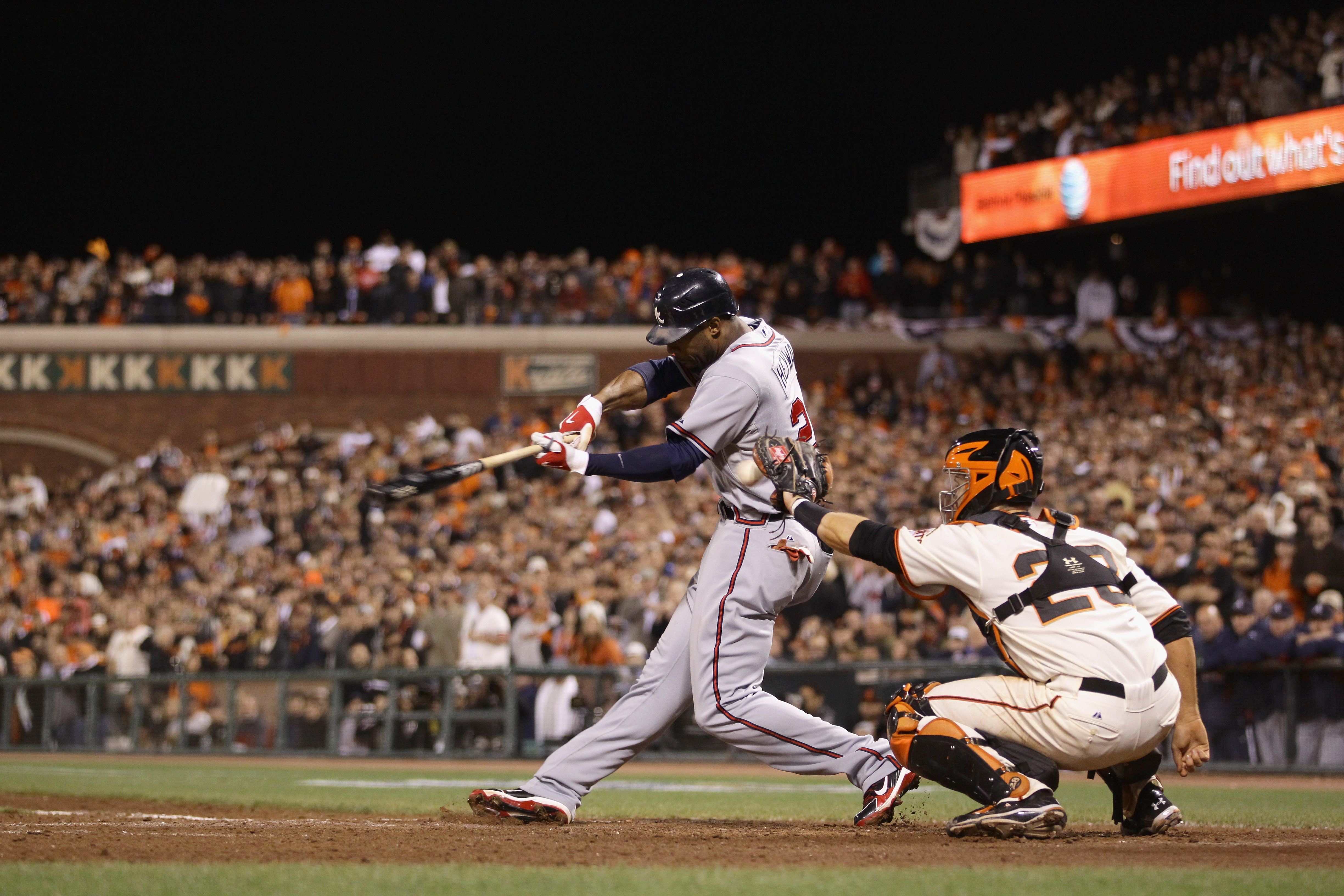 SAN FRANCISCO - OCTOBER 07: Jason Heyward #22 of the Atlanta Braves bats against catcher Buster Posey #28 and the San Francisco Giants during game 1 of the NLDS at AT&T Park on October 7, 2010 in San Francisco, California. (Photo by Ezra Shaw/Getty Imag
