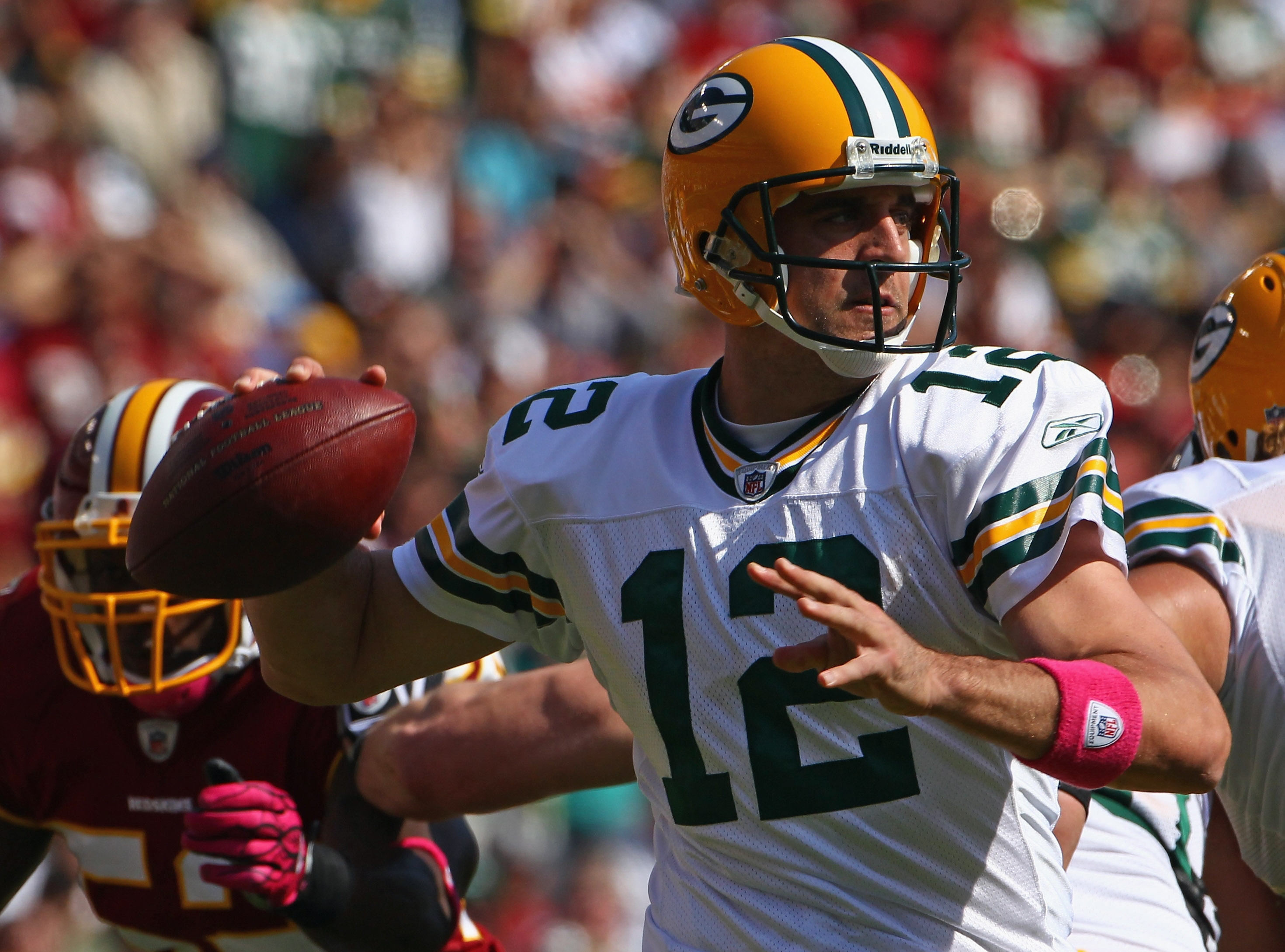 Green Bay's Aaron Rodgers has been hurt by the loss of running back Ryan Grant