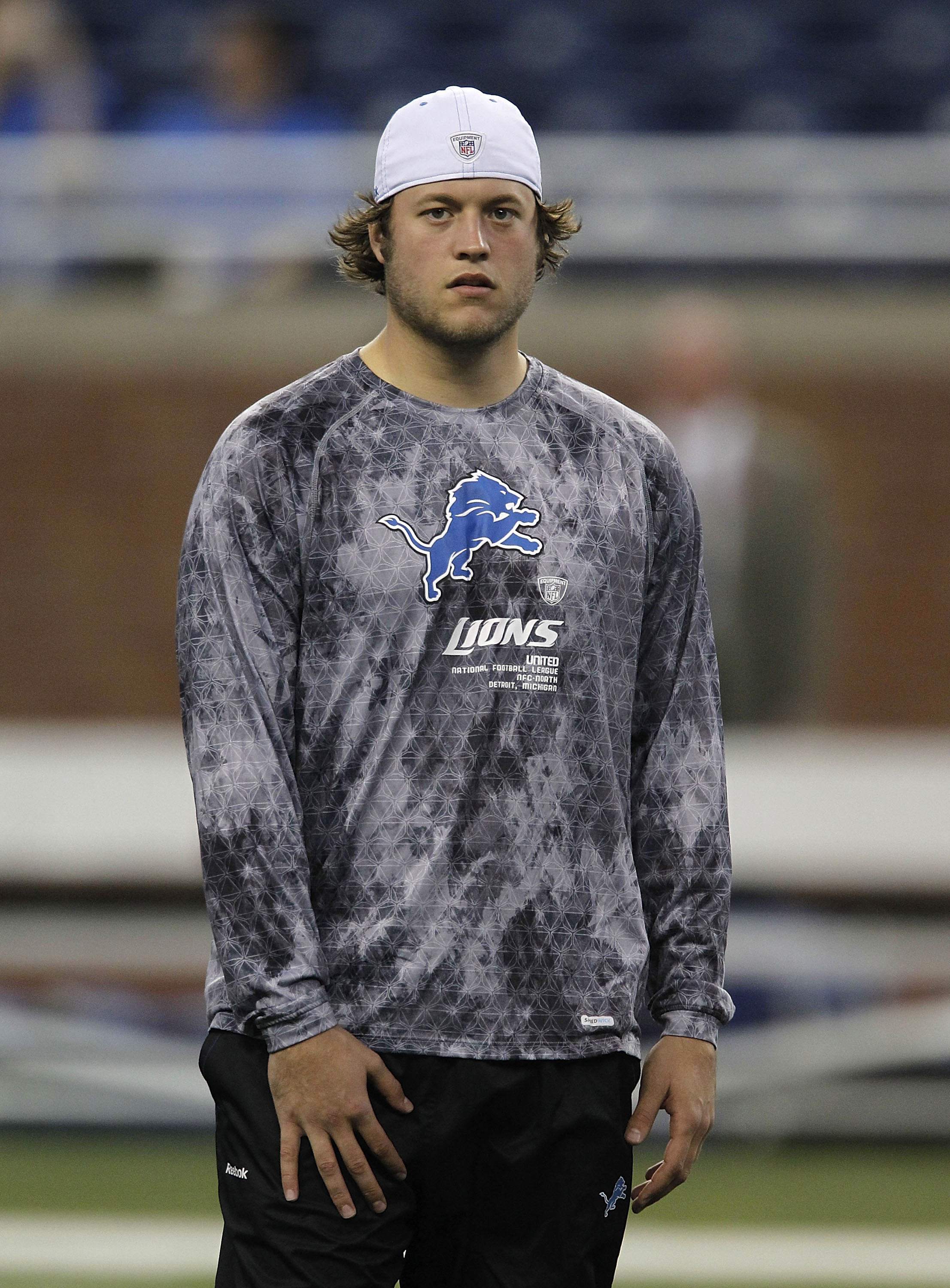 DETROIT - OCTOBER 10:  Matthew Stafford #9 of the Detroit Lions watches the warm ups prior to the start of the game against the St. Louis Rams at Ford Field on October 10, 2010 in Detroit, Michigan.  (Photo by Leon Halip/Getty Images)
