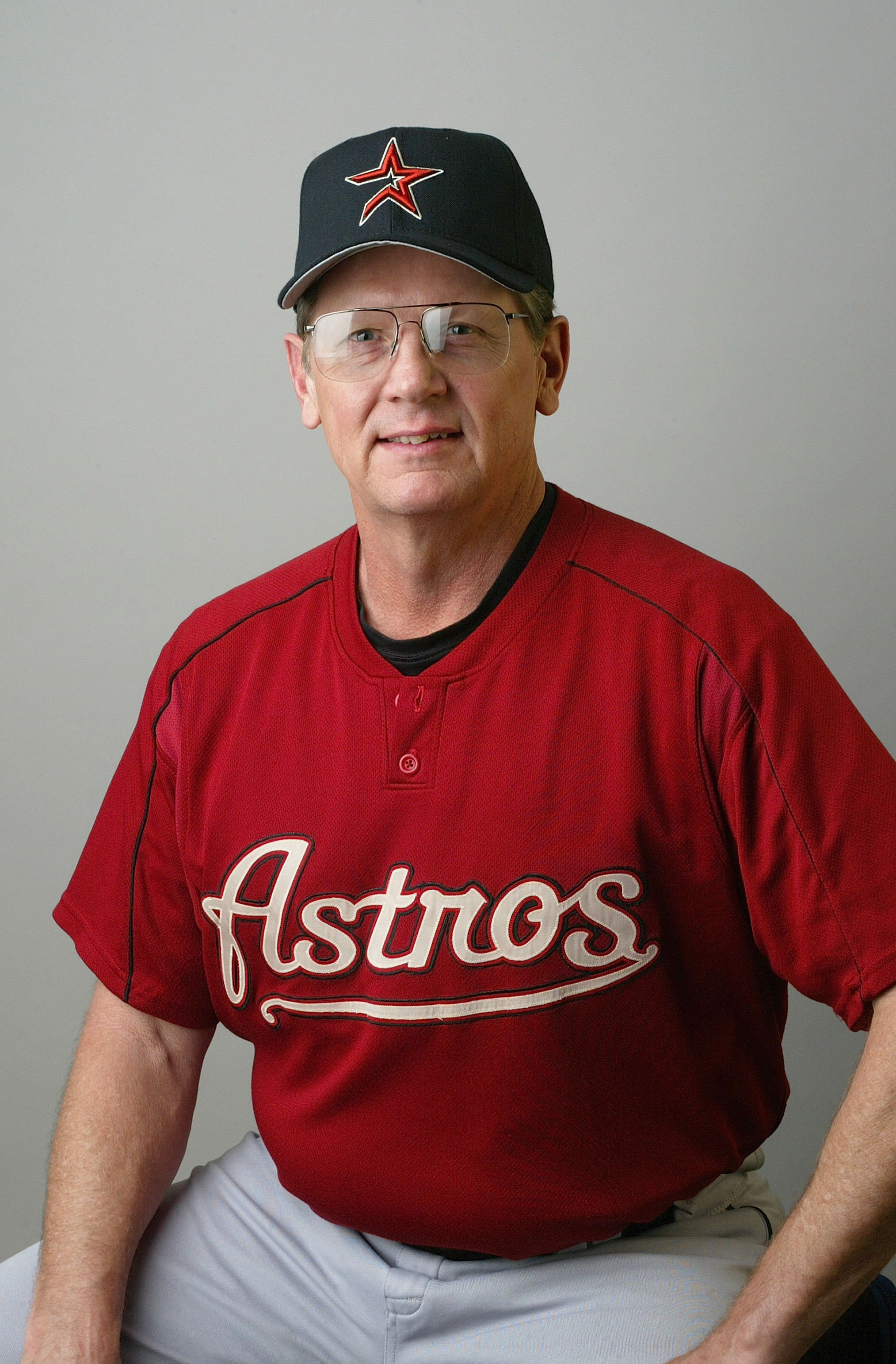 Houston Astros pitching coach Burt Hooten, left, talks to pitcher