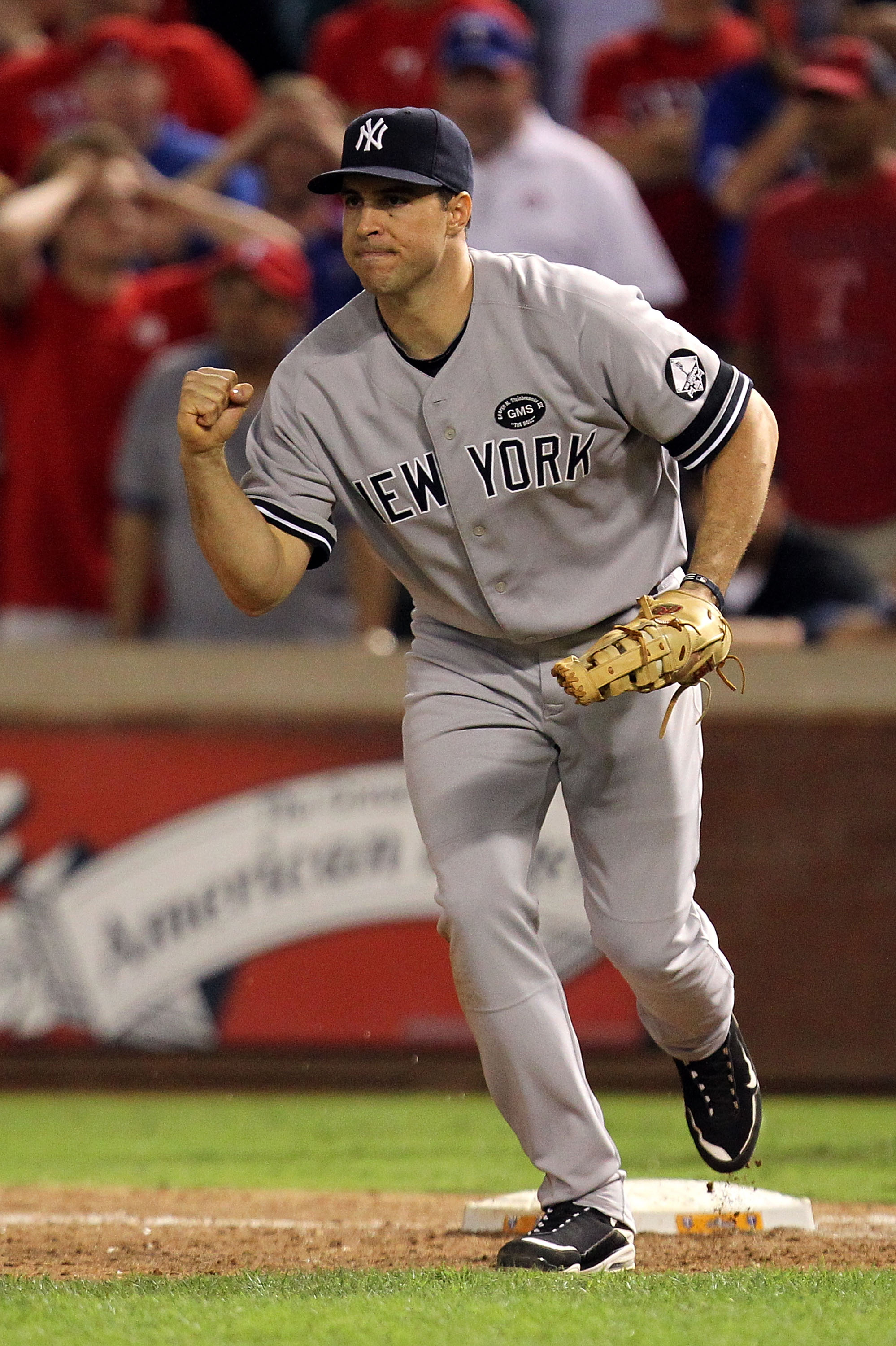 ARLINGTON, TX - OCTOBER 15:  Mark Teixeira #25 of the New York Yankees celebrates after the Yankees recorded the final out of the game in their 6-5 win against the Texas Rangers in Game One of the ALCS during the 2010 MLB Playoffs at Rangers Ballpark in A