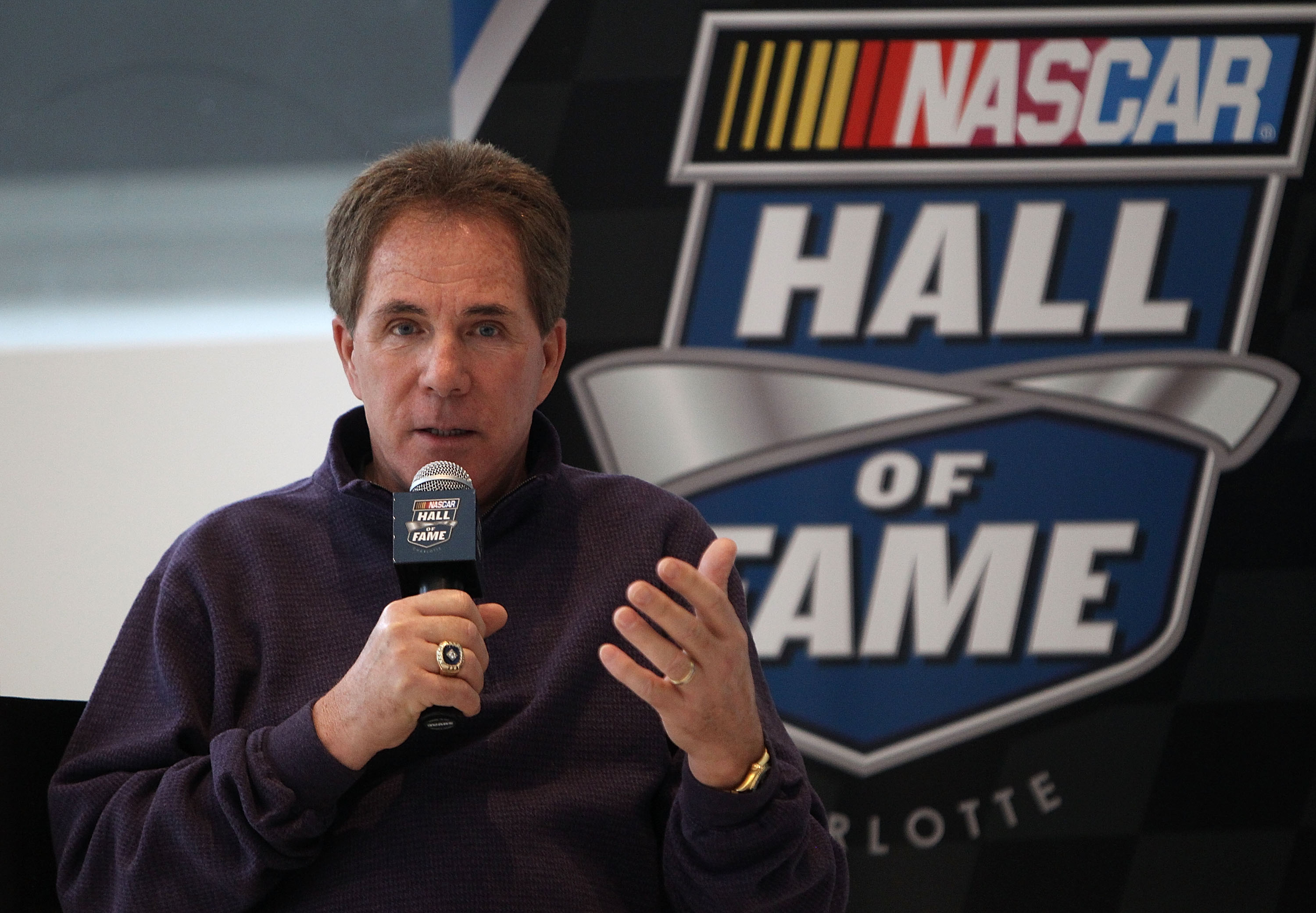 CHARLOTTE, NC - MARCH 22:  Darrell Waltrip speaks to the media about the unveiling of his Championship-winning No. 11 Mountain Dew Buick during the kick off of the final 50 days before the opening of the NASCAR Hall of Fame at the NASCAR Hall of Fame on M