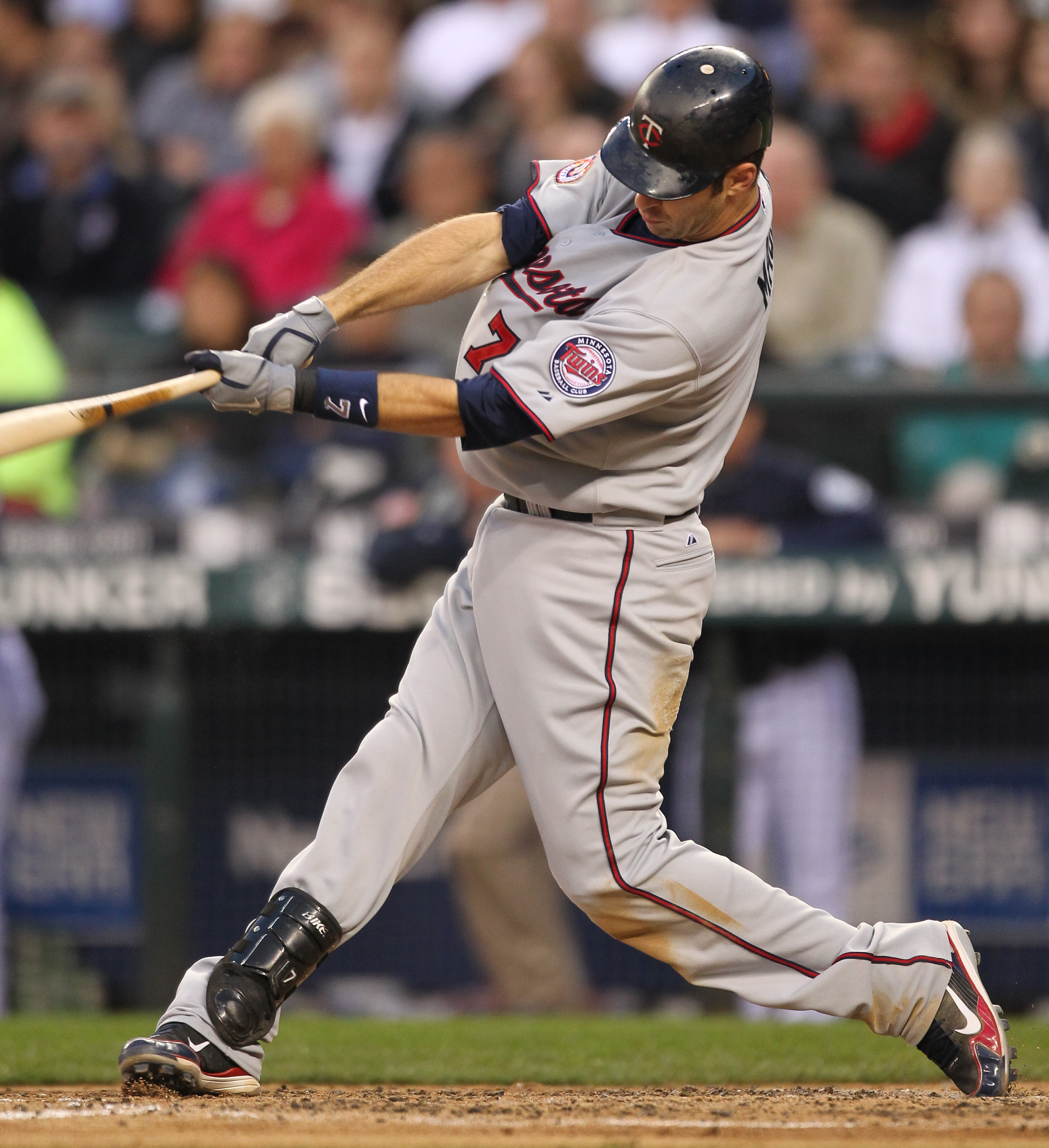 Twins catcher Joe Mauer #7 hits a game tying home run in the top of the 9th  inning during the game between the Minnesota Twins vs Philadelphia Phillies  at Citizens Bank Park