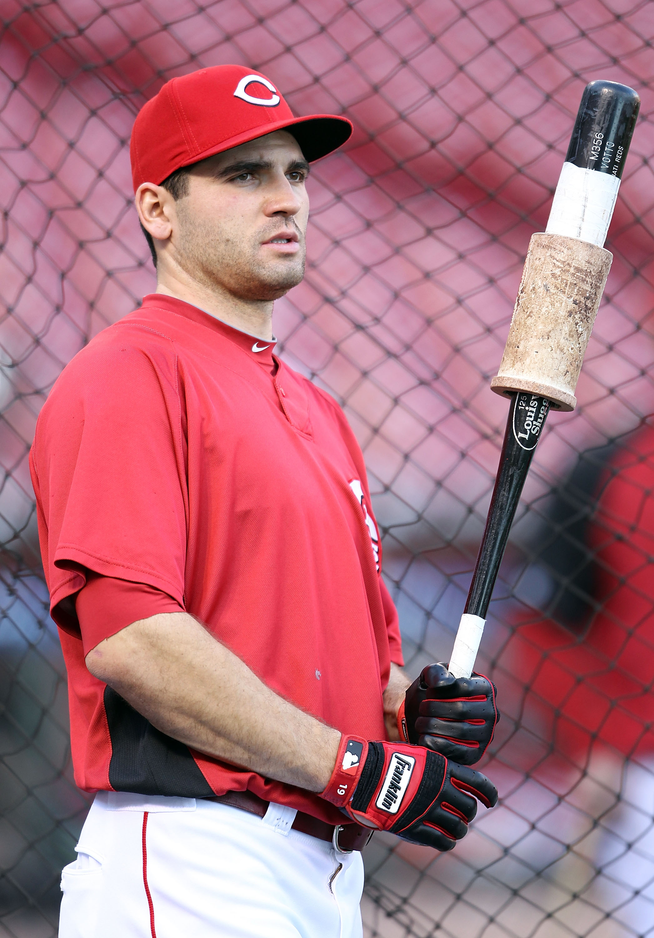 CINCINNATI - OCTOBER 10: Joey Votto #19 of the Cincinnati Reds participates in batting practice before the start of  Game 3 of the NLDS against the Philadelphia Phillies  at Great American Ball Park on October 10, 2010 in Cincinnati, Ohio.  (Photo by Andy