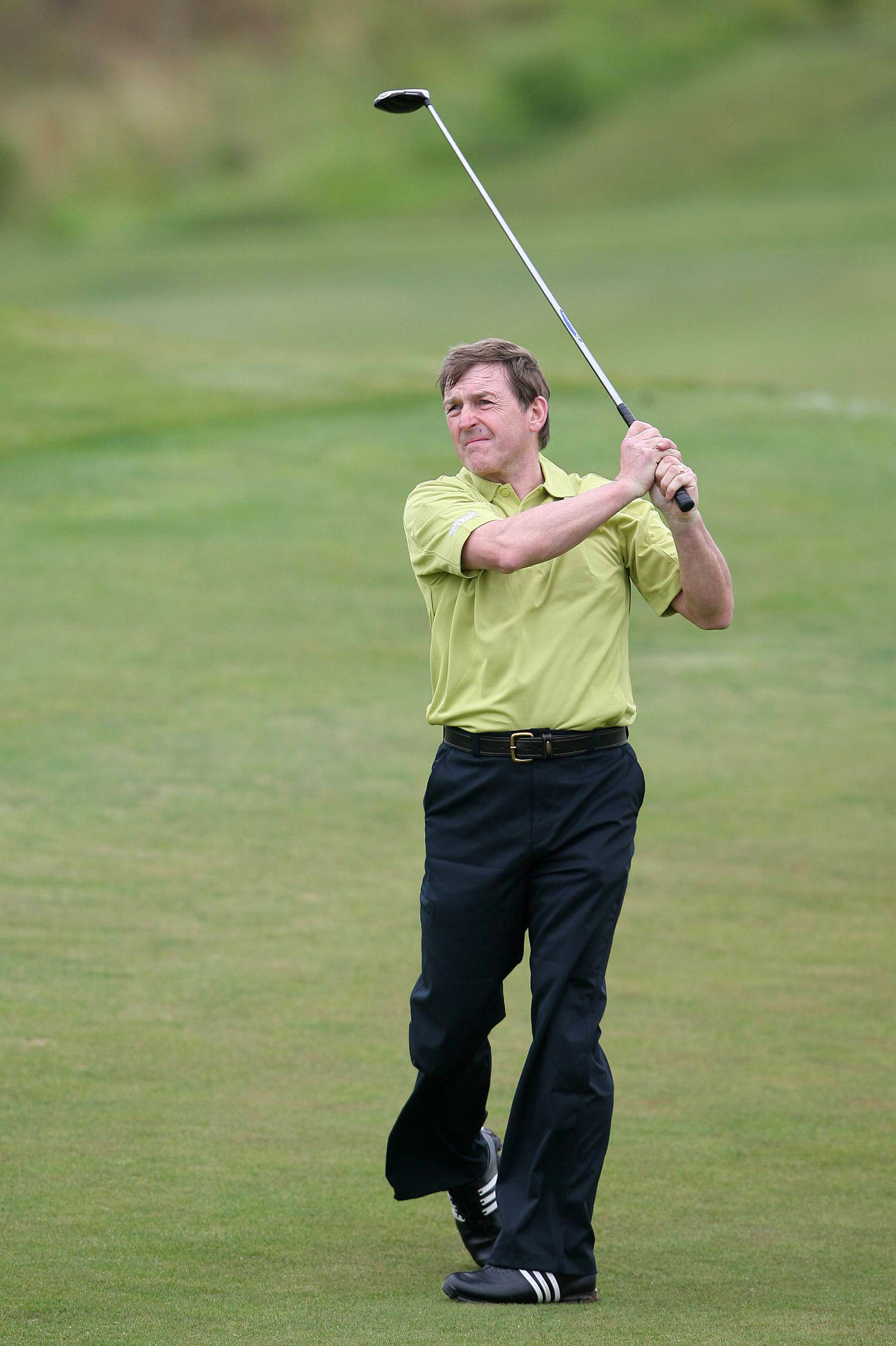 GEORGE, SOUTH AFRICA -  FEBRUARY 11:  Liverpool FC Academy Ambassador Kenny Dalglish of Scotland in action during day one of the Dimension Data Pro-Am at Fancourt on February 11, 2010 in George, South Africa.  (Photo by Carl Fourie/Sunshine Tour/Gallo Ima