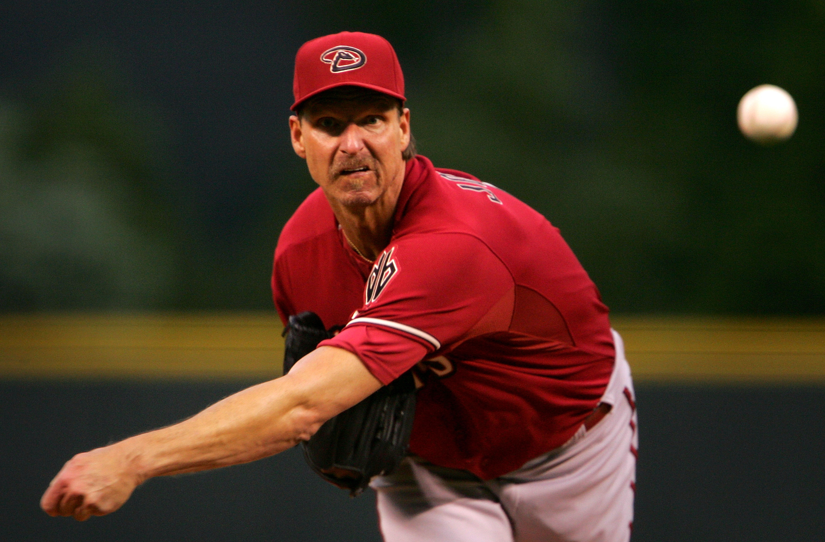 DENVER - MAY 15:  Starting pitcher Randy Johnson #51 of the Arizona Diamondbacks delivers against the Colorado Rockies on May 15, 2007 at Coors Field in Denver, Colorado.  (Photo by Doug Pensinger/Getty Images)