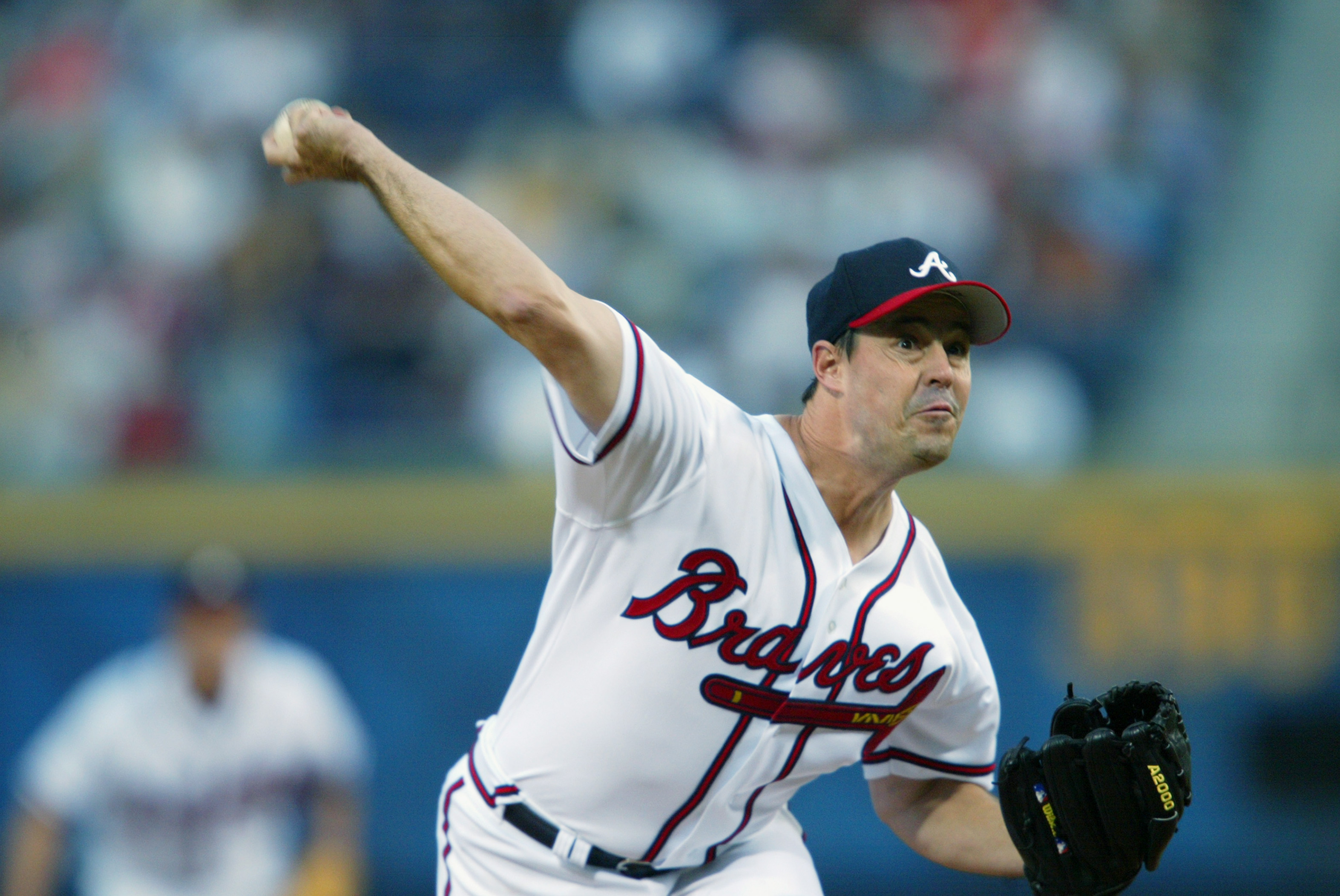ATLANTA - APRIL 18:  Starting pitcher Greg Maddux #31 of the Atlanta Braves in action during the first inning of the game against the Philadelphia Phillies at Turner Fieldon April 18, 2002 in Atlanta, Georgia.  The Braves defeated the Phillies 5-4.  (Phot