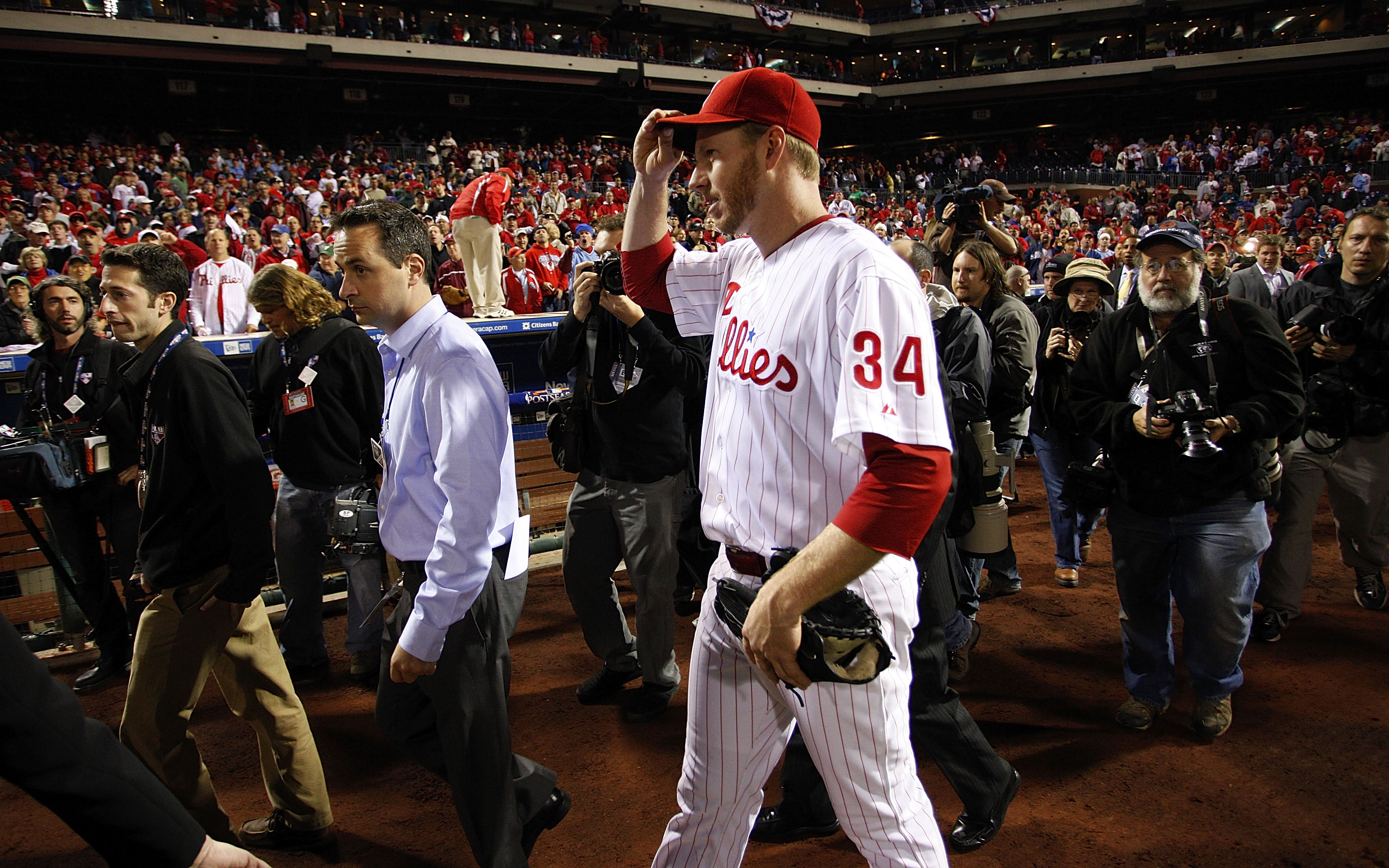 PHILADELPHIA - OCTOBER 06: Roy Halladay #34 of the Philadelphia Phillies walks to the dugout after pitching a no-hitter in Game 1 of the NLDS against the Cincinnati Reds at Citizens Bank Park on October 6, 2010 in Philadelphia, Pennsylvania. (Photo by J