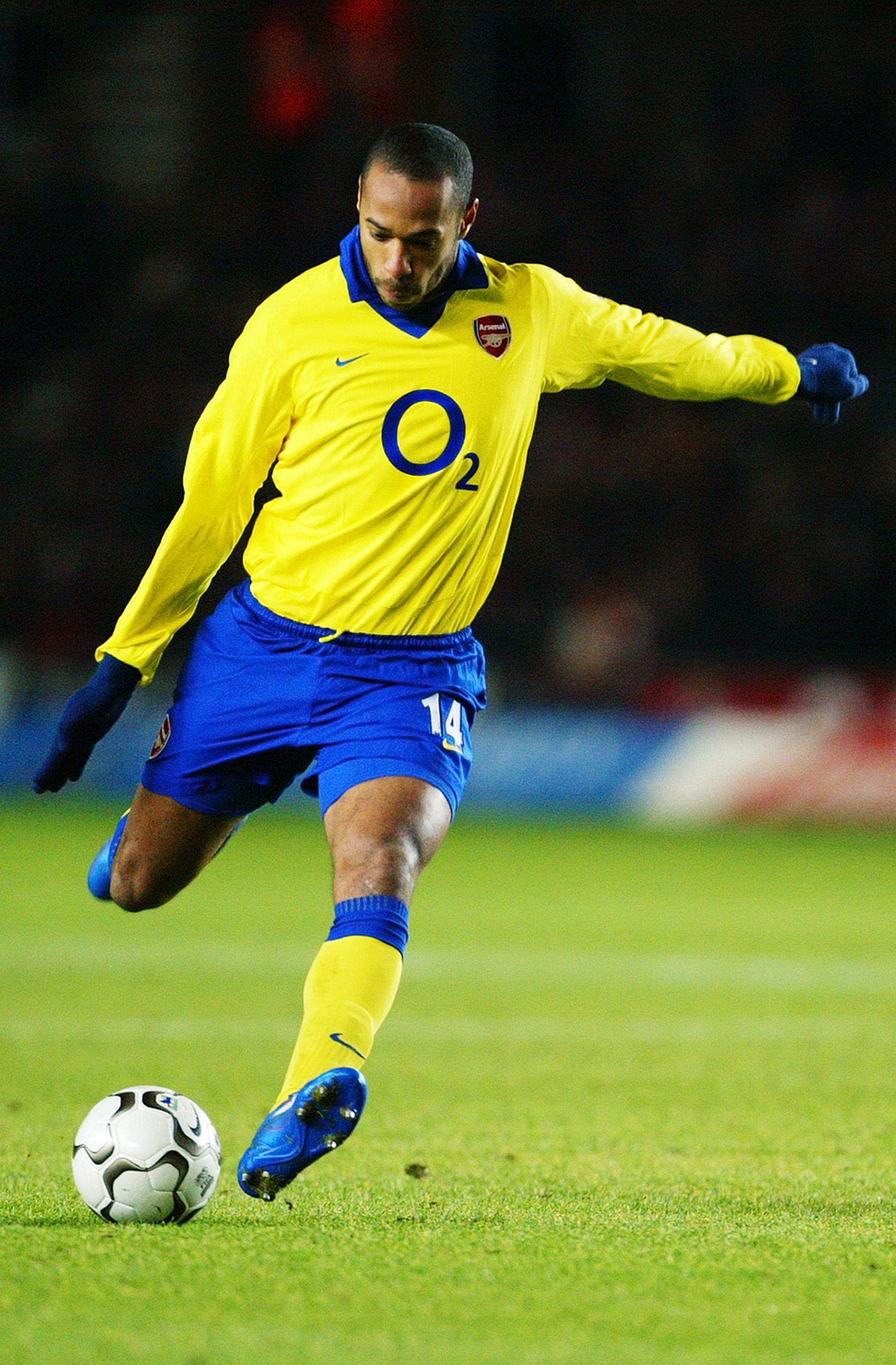 SOUTHAMPTON - DECEMBER 29:  Thierry Henry of Arsenal strikes the ball during the FA Barclaycard Premiership match between Southampton and Arsenal on December 29, 2003 at St Mary's Stadium in Southampton, England.  Arsenal won the match 1-0.  (Photo by Mik