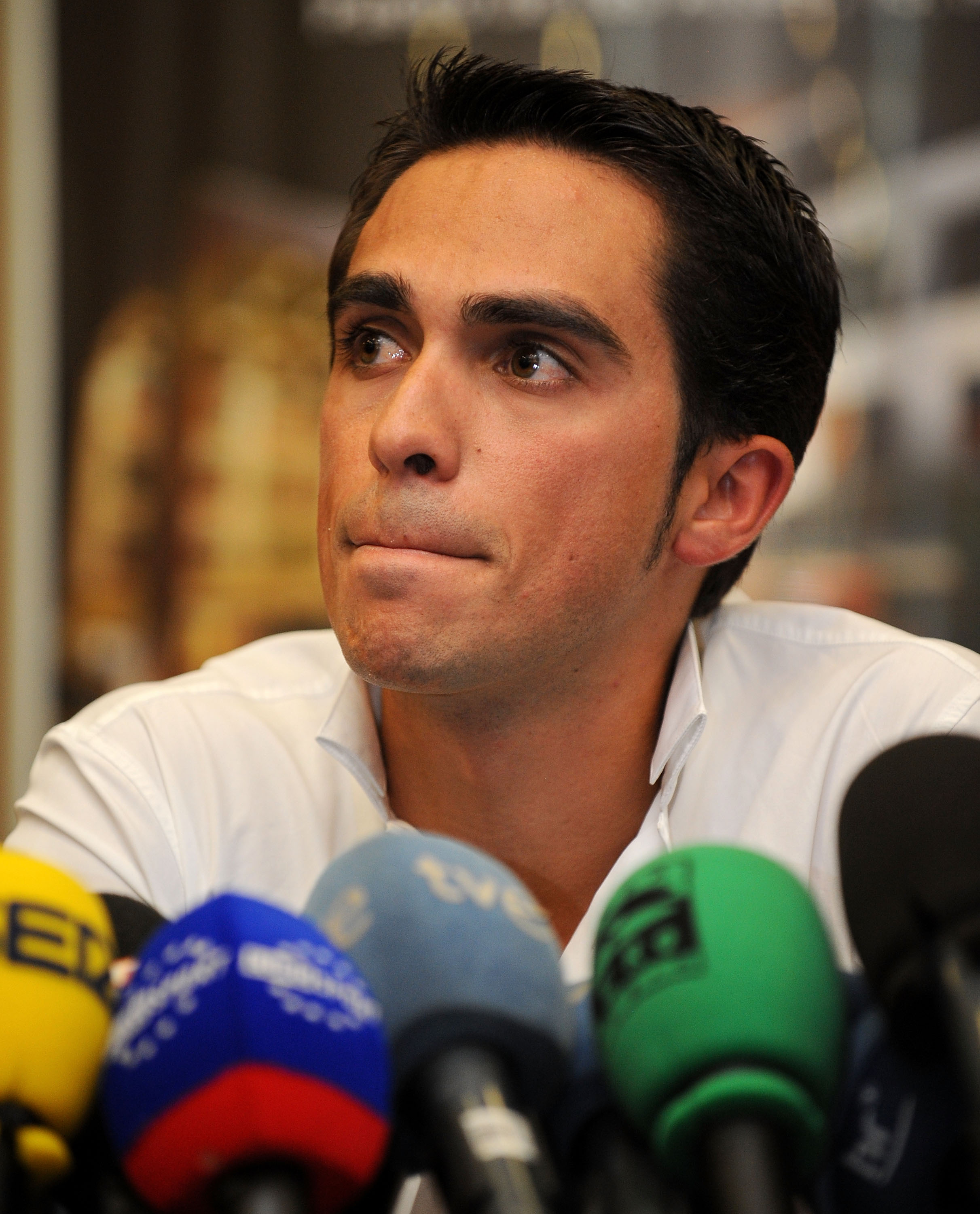 PINTO, SPAIN - SEPTEMBER 30:  Alberto Contador listens to questions from the media during his press conference pleading his innocence after being tested positive for clenbuterol, a fat-burning and muscle-building drug, during this year's Tour de France, o