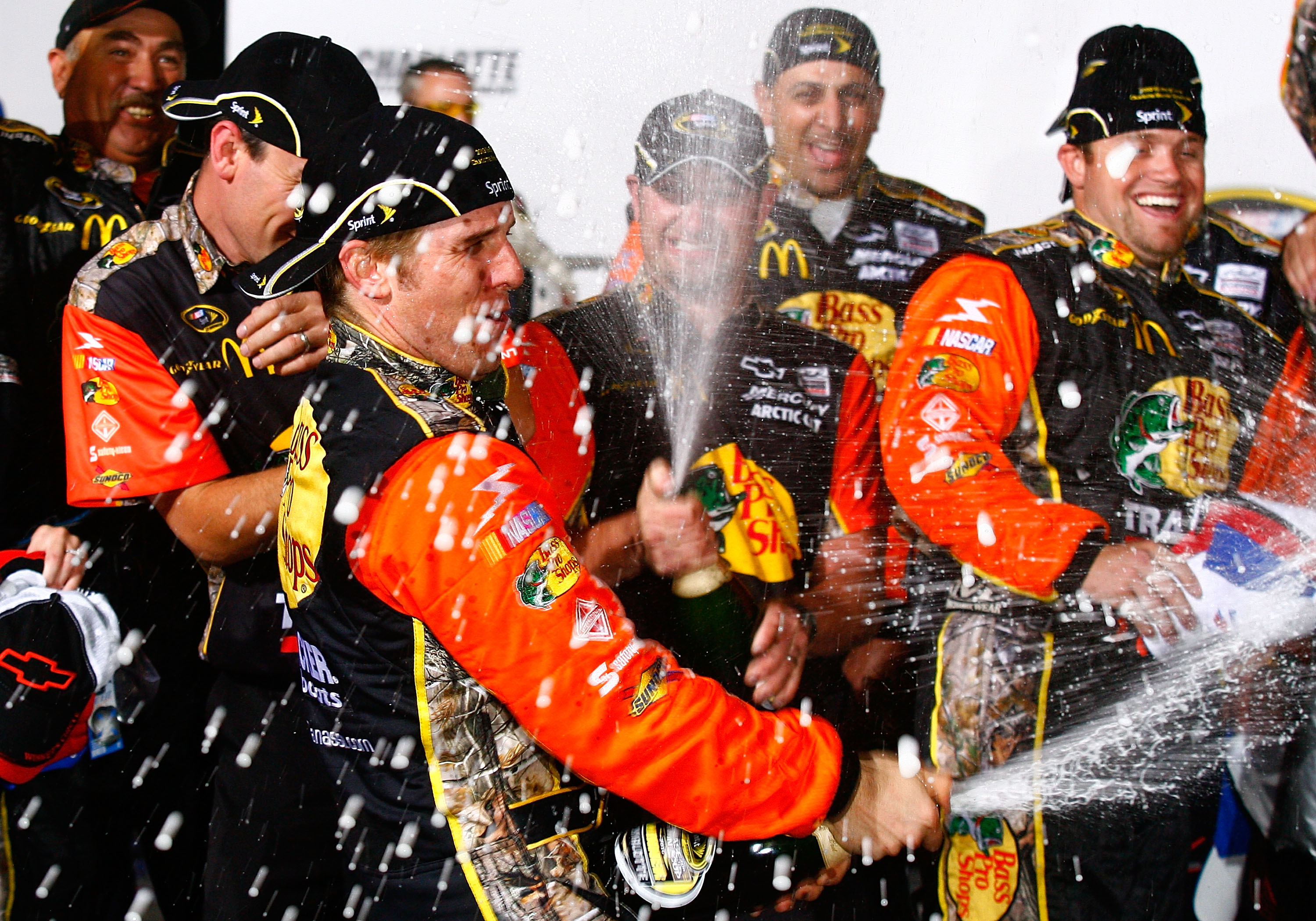 CONCORD, NC - OCTOBER 16:  Jamie McMurray, driver of the #1 Bass Pro Shops/Tracker Boats Chevrolet, celebrates in Victory Lane after winning the NASCAR Sprint Cup Series Bank of America 500 at Charlotte Motor Speedway on October 16, 2010 in Concord, North