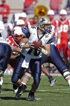 Oct 16, 2005; San Antonio, TX, USA; NFL FOOTBALL: Atlanta Falcons vs New  Orleans Saints. Falcons' Michael Vick runs from the Saints' Dwight Smith at  the Alamodome. The Falcons went on to