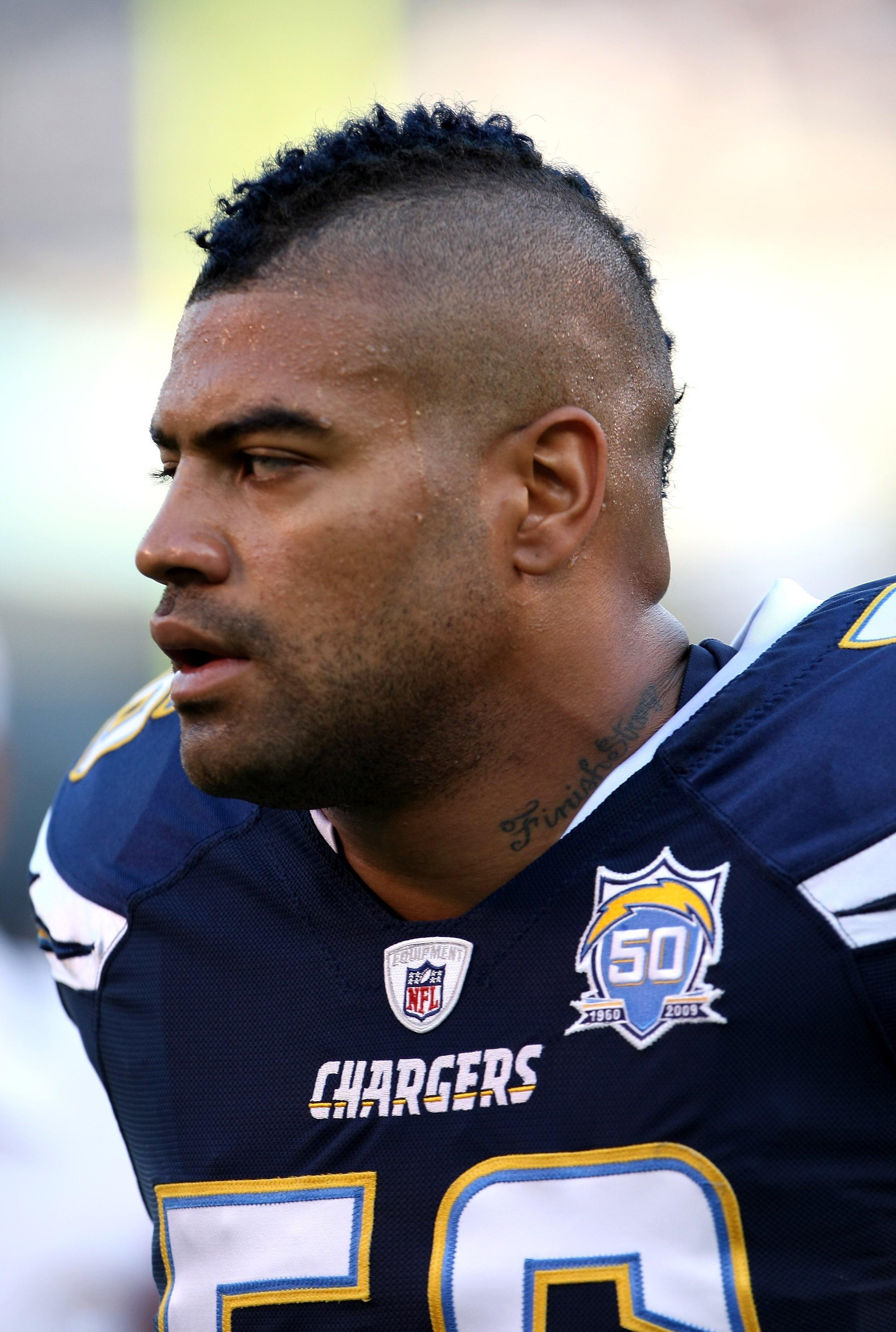 San Diego Chargers linebacker Shawne Merriman stretches before the NFL  football game between the Oakland Raiders against the San Diego Chargers,  Monday, Sept. 14, 2009 in Oakland, Calif.(AP Photo/Marcio Sanchez Stock  Photo 