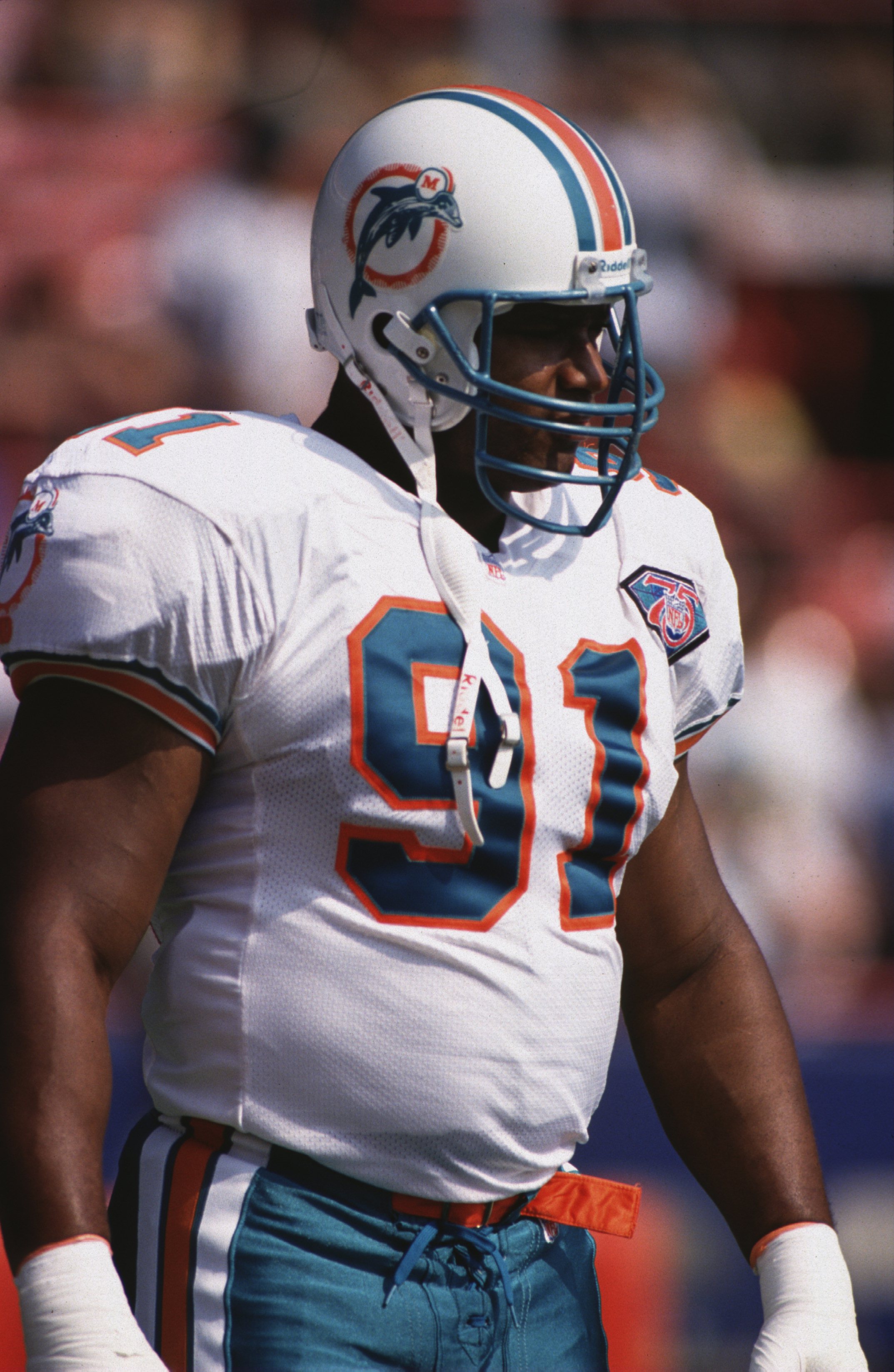 11 Sep 1994:  Defensive End Jeff Cross of the Miami Dolphins looks across the line during the Dolphins 24-14 win over the Green Bay Packers at Milwaukee County Stadium in Milwaukee, Wisconsin. Mandatory Credit: Jonathan Daniel/ALLSPORT