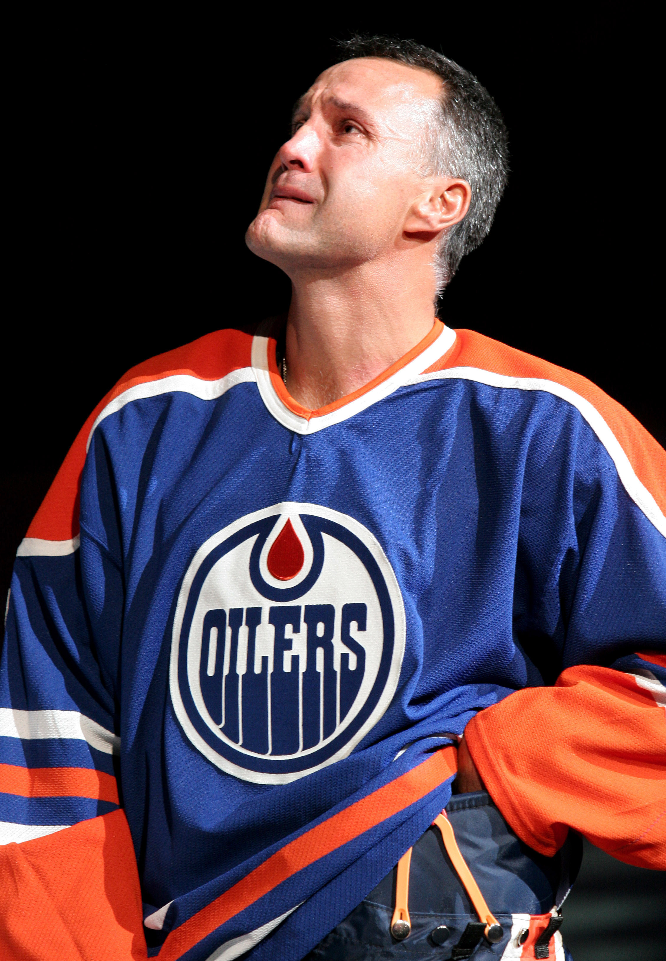 EDMONTON, CANADA - OCTOBER 18:  Edmonton Oiler great Paul Coffey fights back tears as he watches his number 7 retirement banner being raised to the rafters during a special ceremony on October 18, 2005 at Rexall Place in Edmonton, Alberta, Canada.  (Photo