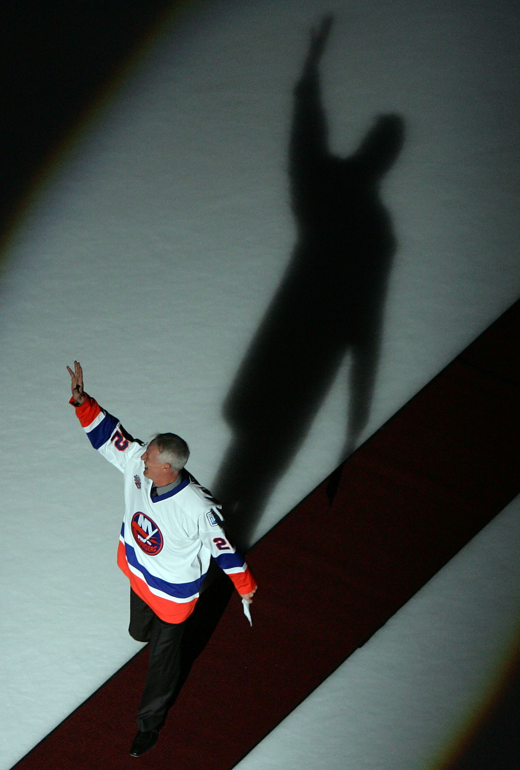 UNIONDALE, NY - MARCH 02:  Former New York Islanders legend Mike Bossy waves to the crowd before the game against the Florida Panthers at the Nassau Coliseum March 2, 2008 in Uniondale, New York. The Islanders are celebrating the 17 men that were part of