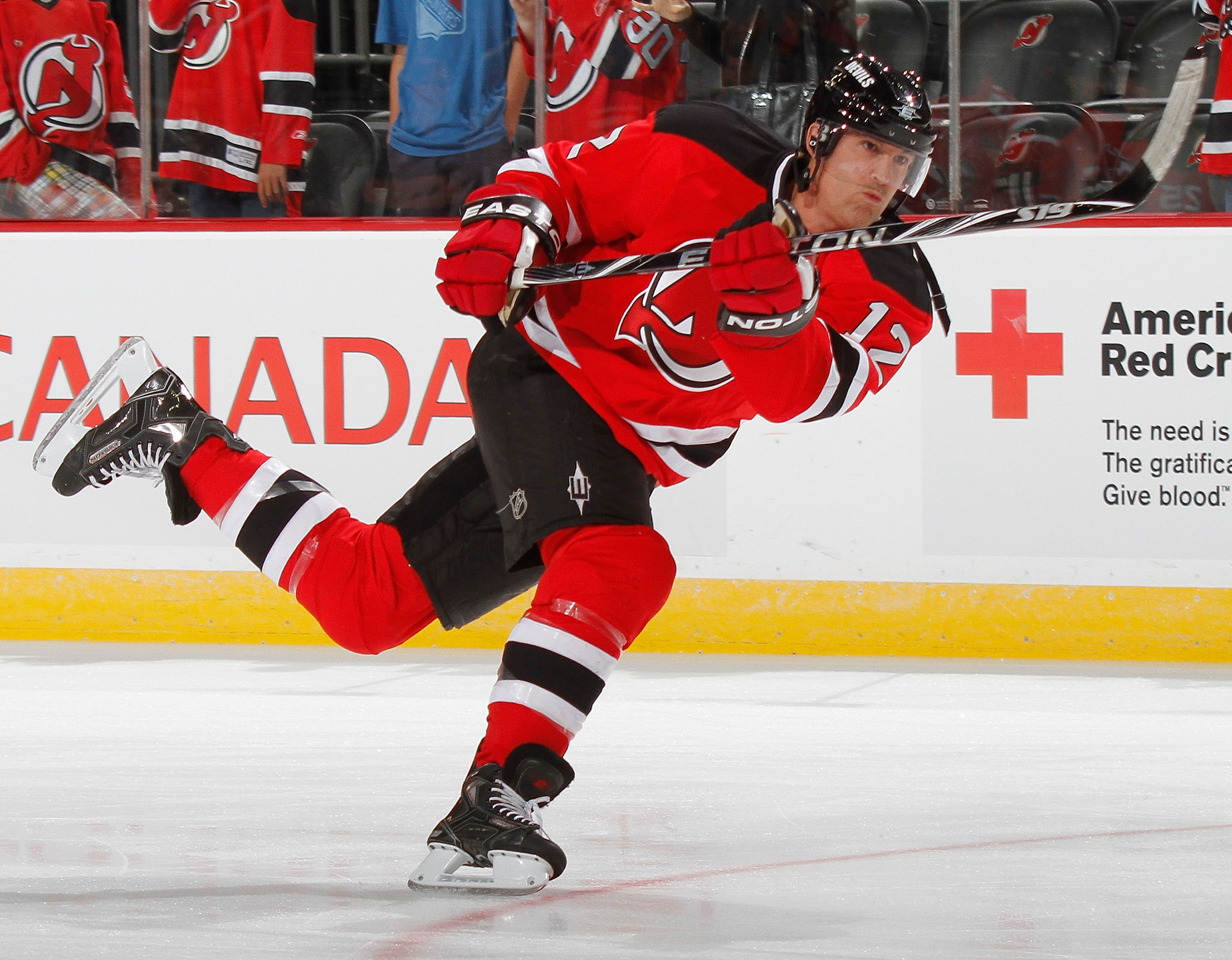 NEWARK, NJ - SEPTEMBER 25:  Brian Rolston #12 of the New Jersey Devils during  warmups before a preseason hockey game against the New York Rangers at the Prudential Center on September 25, 2010 in Newark, New Jersey.  (Photo by Paul Bereswill/Getty Images