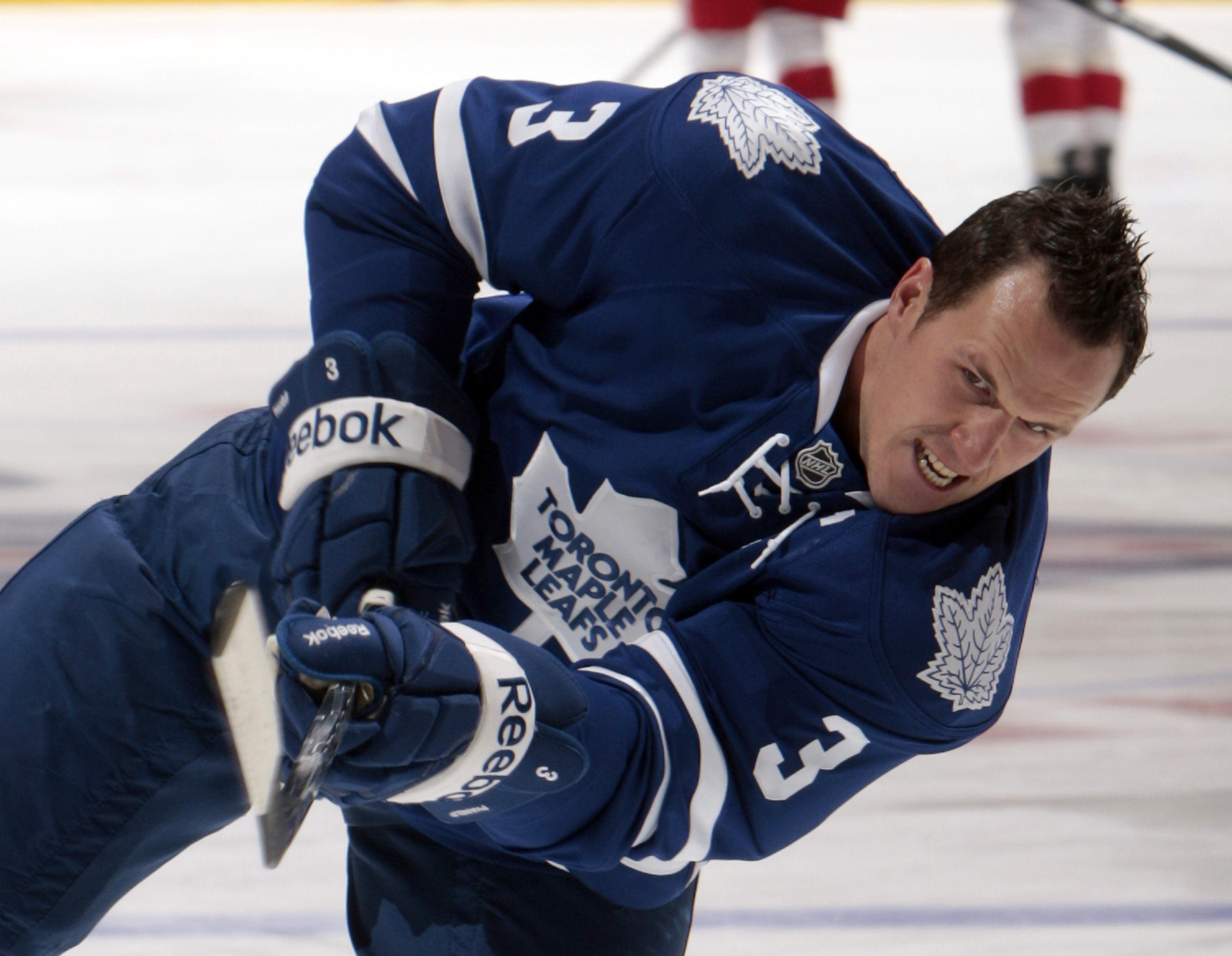 TORONTO - OCTOBER 2: Dion Phaneuf #3 of the Toronto Maple Leafs shoots during warm-up before playing the Detroit Red Wings during a preseason NHL game at the Air Canada Centre October 2, 2010 in Toronto, Ontario, Canada. (Photo by Abelimages/Getty Images)