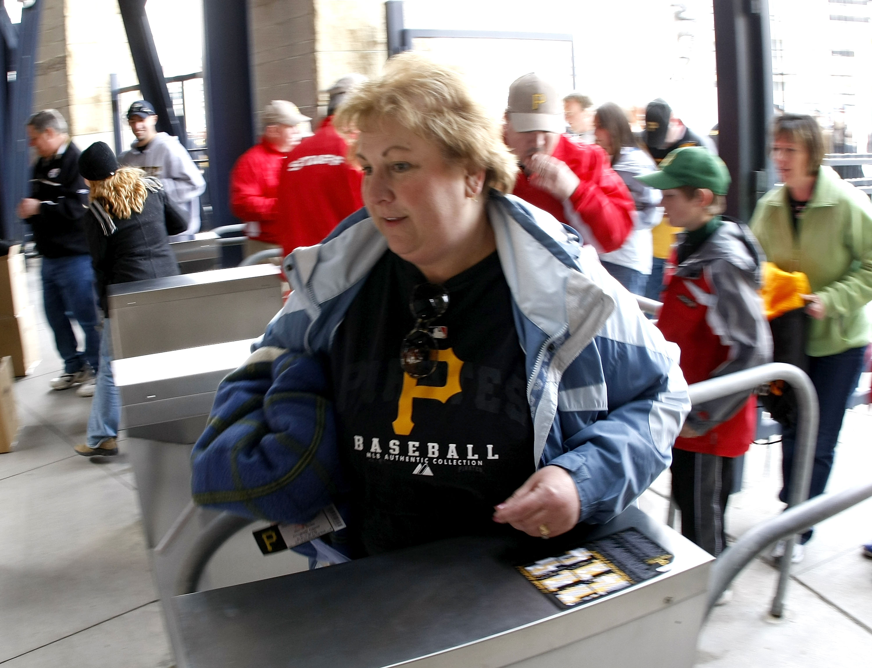 PITTSBURGH - APRIL 13:  Fans enter the ballpark on opening day for the Pittsburgh Pirates prior to playing the Houston Astros at PNC Park April 13, 2009 in Pittsburgh, Pennsylvania.  (Photo by Gregory Shamus/Getty Images)