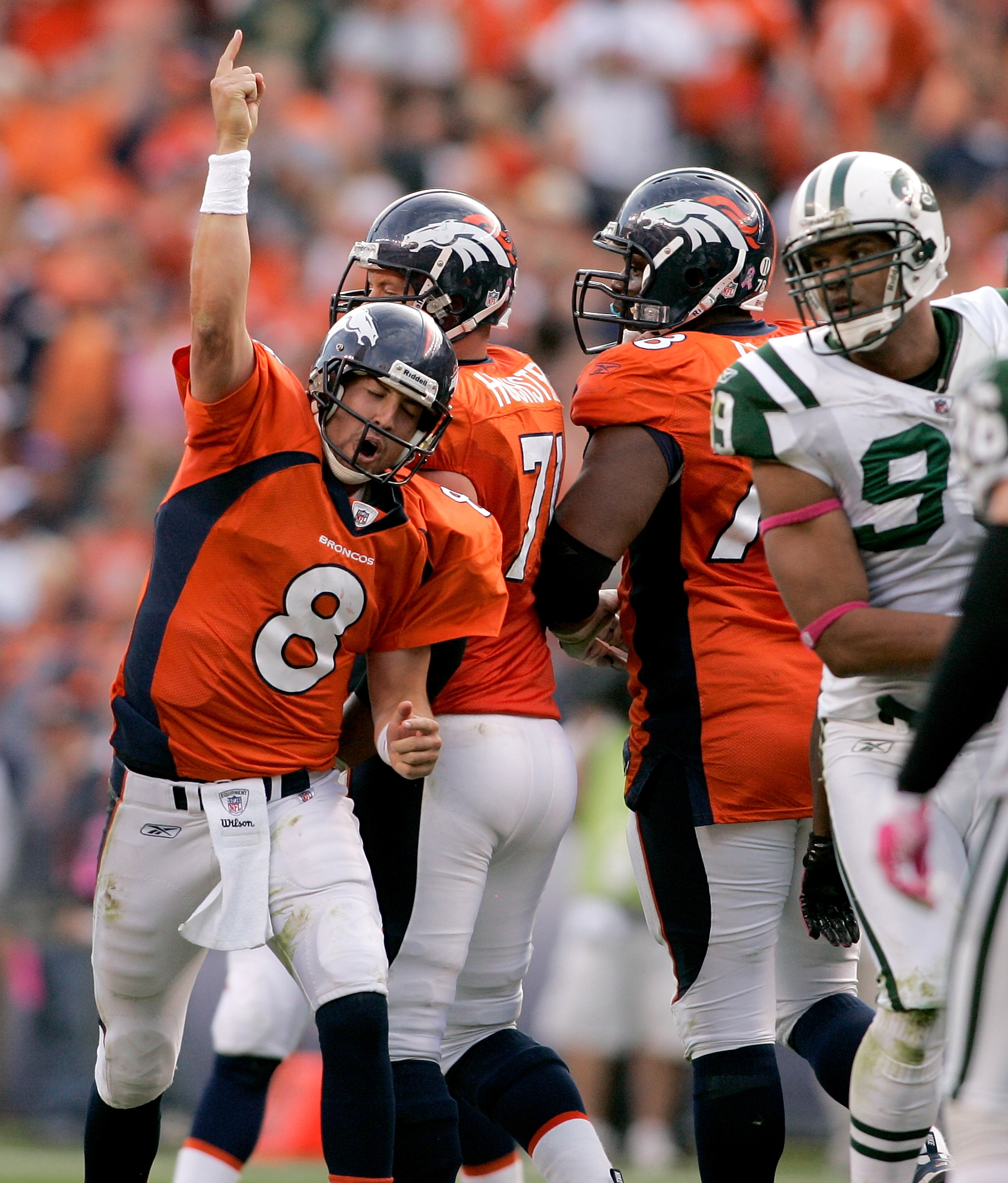 DENVER - OCTOBER 17:  Quarterback Kyle Orton #8 of the Denver Broncos signals for a first down against the New York Jets at INVESCO Field at Mile High on October 17, 2010 in Denver, Colorado.  (Photo by Justin Edmonds/Getty Images)