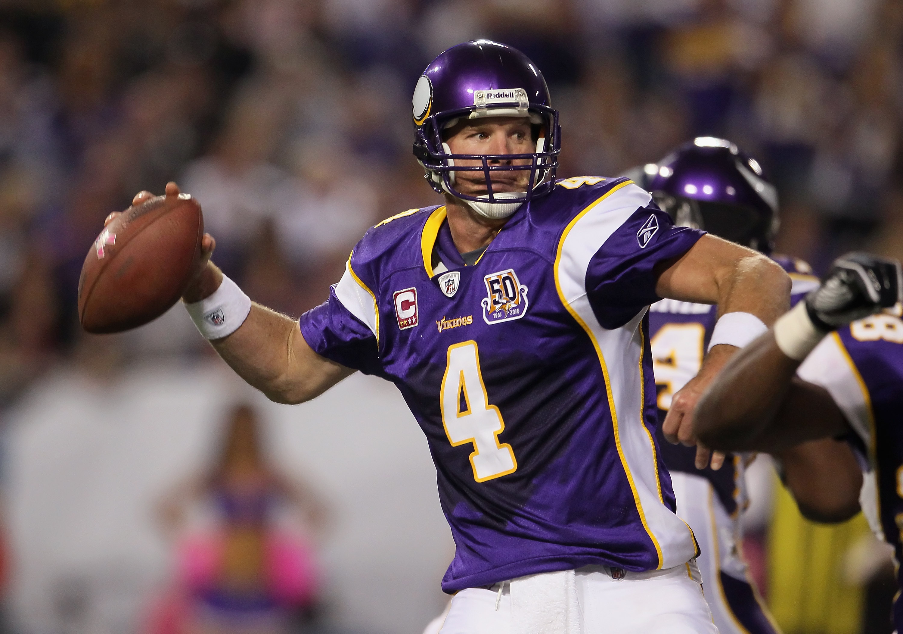 MINNEAPOLIS - OCTOBER 17:  Quarterback Brett Favre #4 of the Minnesota Vikings drops back to pass during the fourth quarter against the Dallas Cowboys at Mall of America Field on October 17, 2010 in Minneapolis, Minnesota. The Vikings defeated the Cowboys