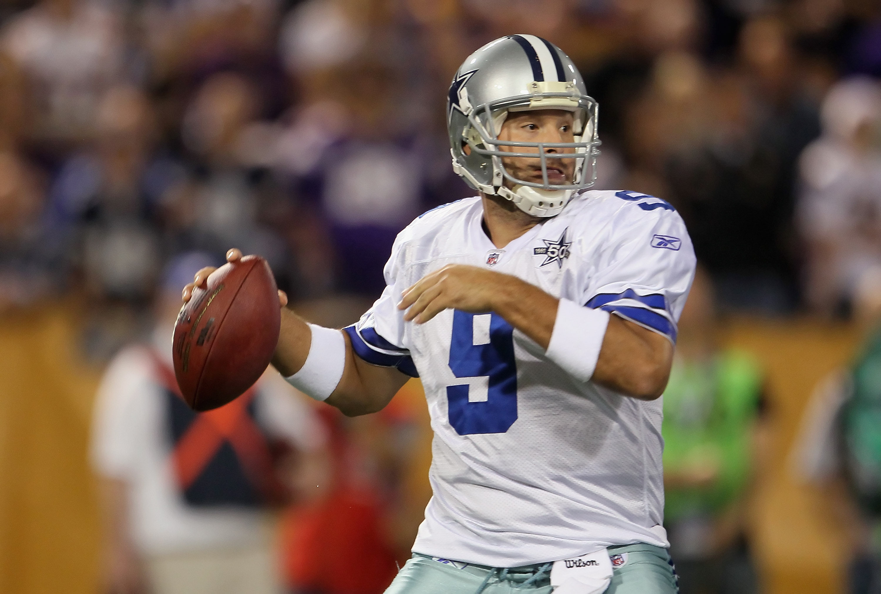 MINNEAPOLIS - OCTOBER 17:  Quarterback Tony Romo #9 of the Dallas Cowboys drops back to pass in the first quarter against the Minnesota Vikings at Mall of America Field on October 17, 2010 in Minneapolis, Minnesota.  (Photo by Jeff Gross/Getty Images)