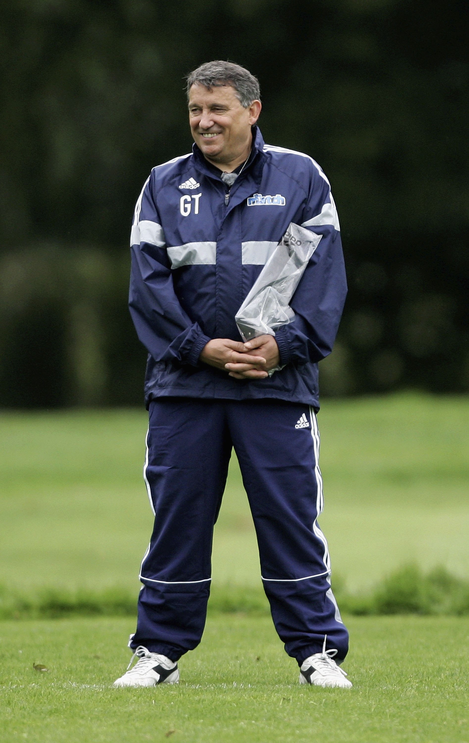LONDON - SEPTEMBER 02:  Graham Taylor takes notes on the pitch during the trials for Sky One's The Match at Bisham Abbey on September 2, 2006 in London, England. Celebrities are taking part in the trials where former England manager Graham Taylor will sel