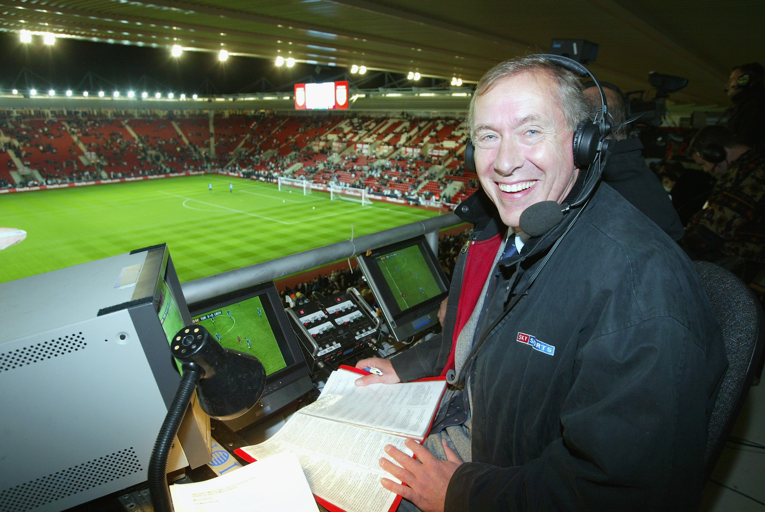 SOUTHAMPTON - OCTOBER 16:  Sky television commentator Martin Tyler in the commentary boxbefore the Euro 2004 Championship Qualifying match between England and Macedonia on October 16, 2002 at St. Mary's Stadium in Southampton, England. (Photo by Mike Hewi