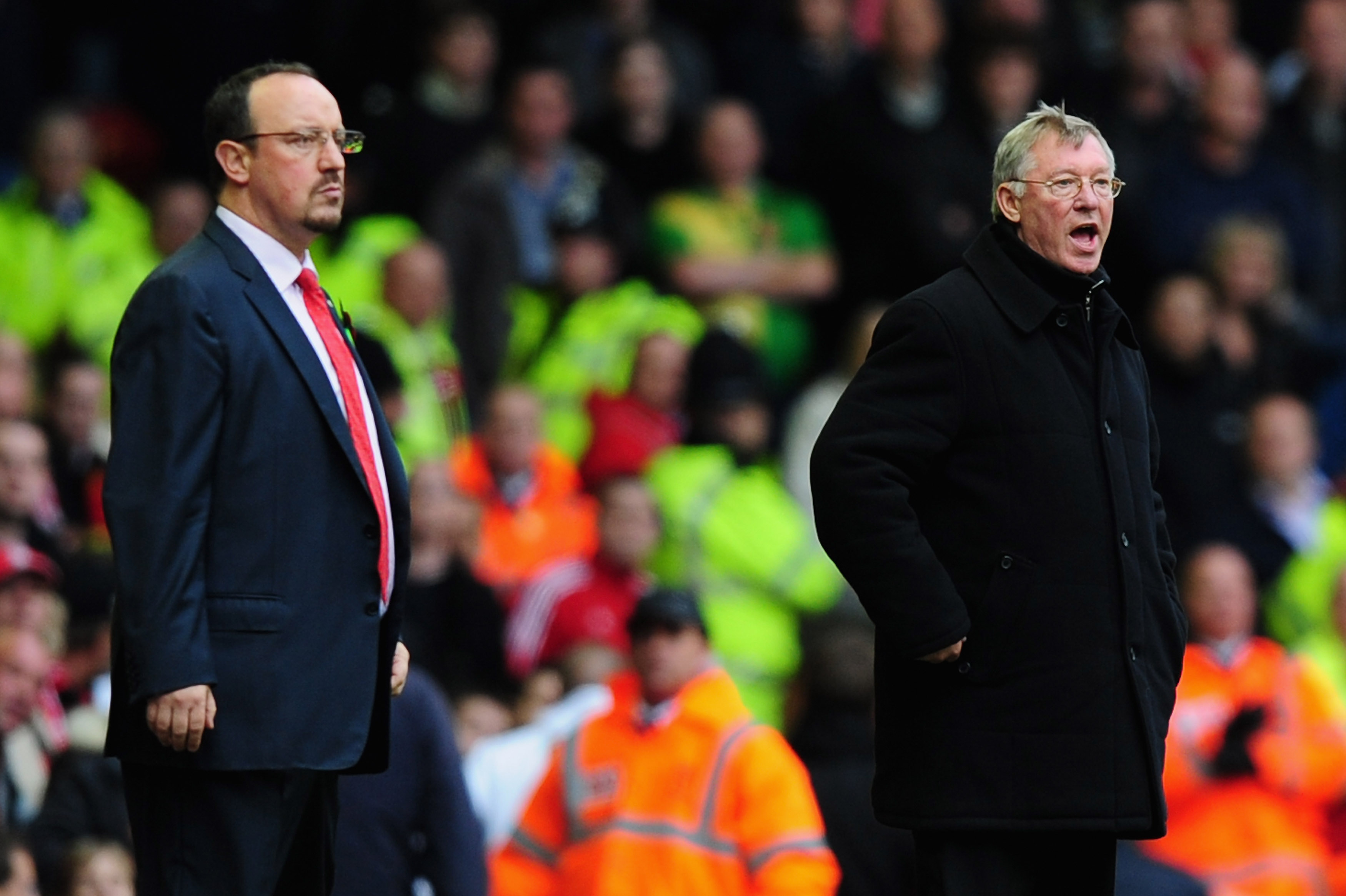 LIVERPOOL, UNITED KINGDOM - OCTOBER 25:  Manchester United Manager Sir Alex Ferguson shouts from the touch line as Liverpool Manager Rafael Benitez (L) looks on during the Barclays Premier League match between Liverpool and Manchester United at Anfield on