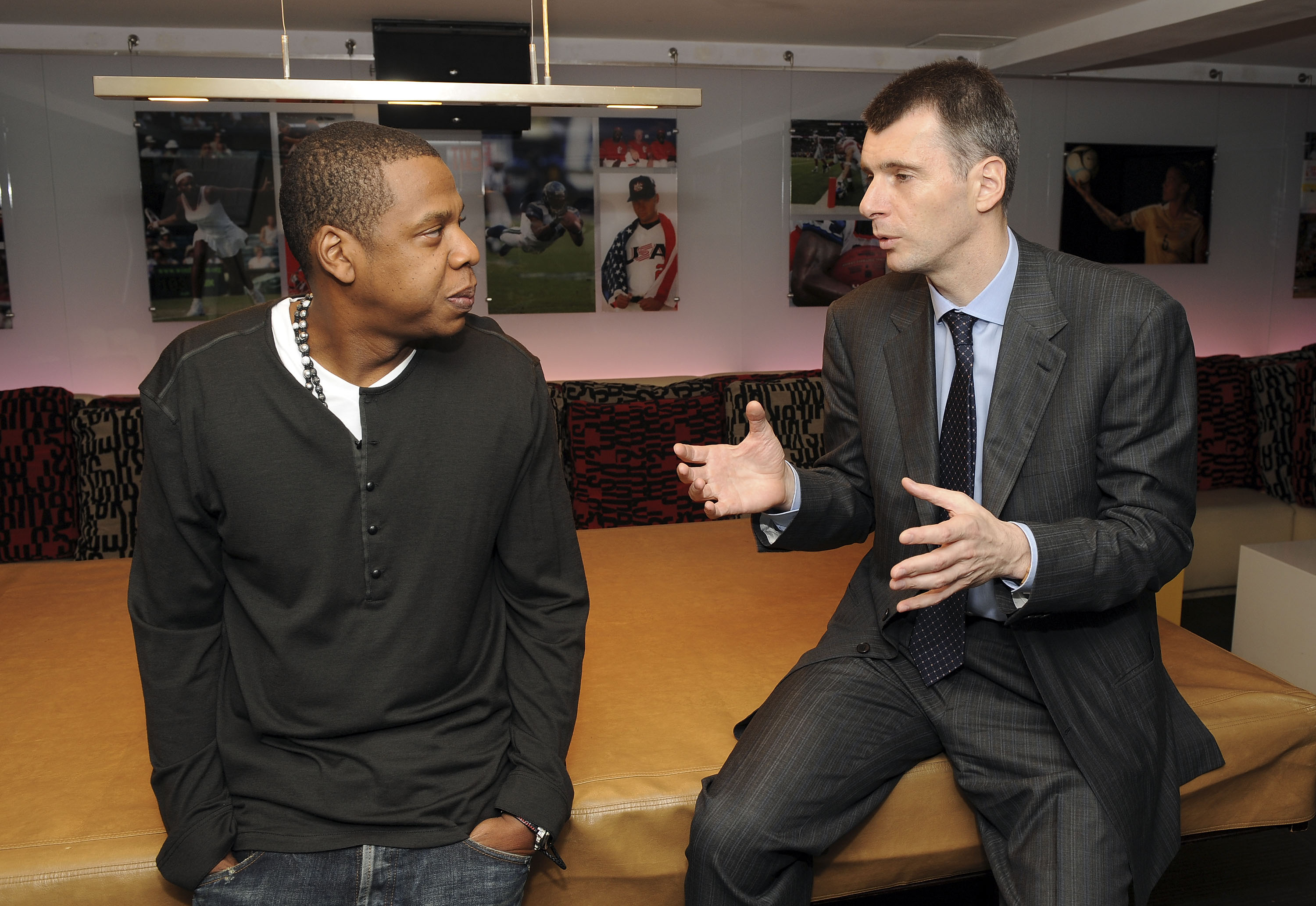 NEW YORK - MAY 18:  (EXCLUSIVE) Cultural icon and Nets investor JAY-Z and Nets owner Mikhail Prokhorov celebrate Prokhorov's purchase of the team at lunch today at JAY-Z's 40/40 club on May 18, 2010 in New York City. Prokhorov is representing the Nets ton