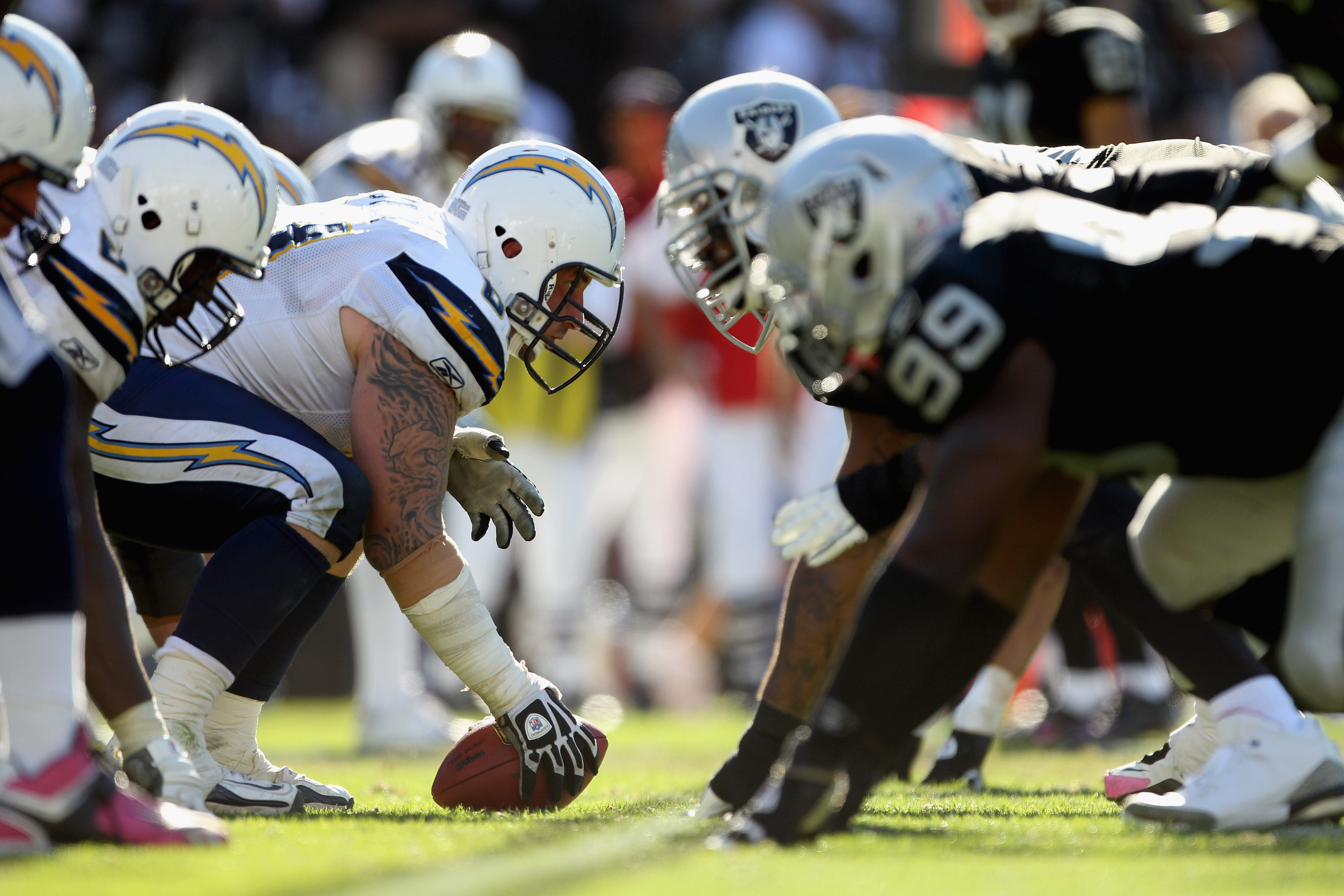 OAKLAND, CA - OCTOBER 10:  Nick Hardwick #61 at center and the rest of the San Diego Chargers line up against the Oakland Raiders at Oakland-Alameda County Coliseum on October 10, 2010 in Oakland, California.  (Photo by Ezra Shaw/Getty Images)