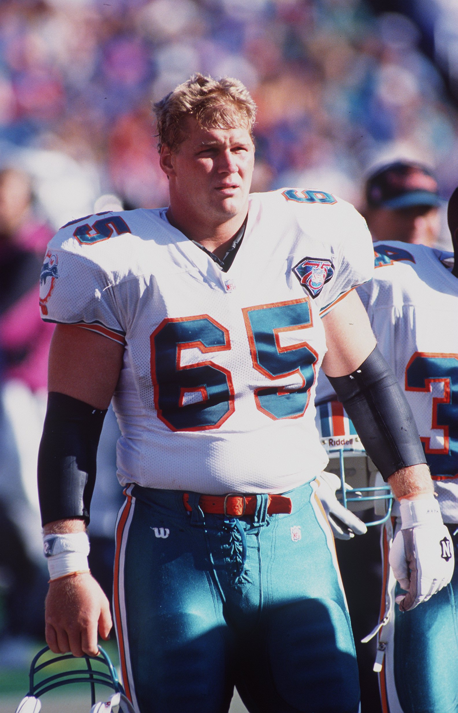 9 Oct 1994: JEFF DELLENBACH OF THE MIAMI DOLPHINS WATCHES THE ACTION FROM THE SIDELINES DURING THEIR 21-11 LOSS TO THE BUFFALO BILLS AT RICH STADIUM IN ORCHARD PARK, NEW YORK.
