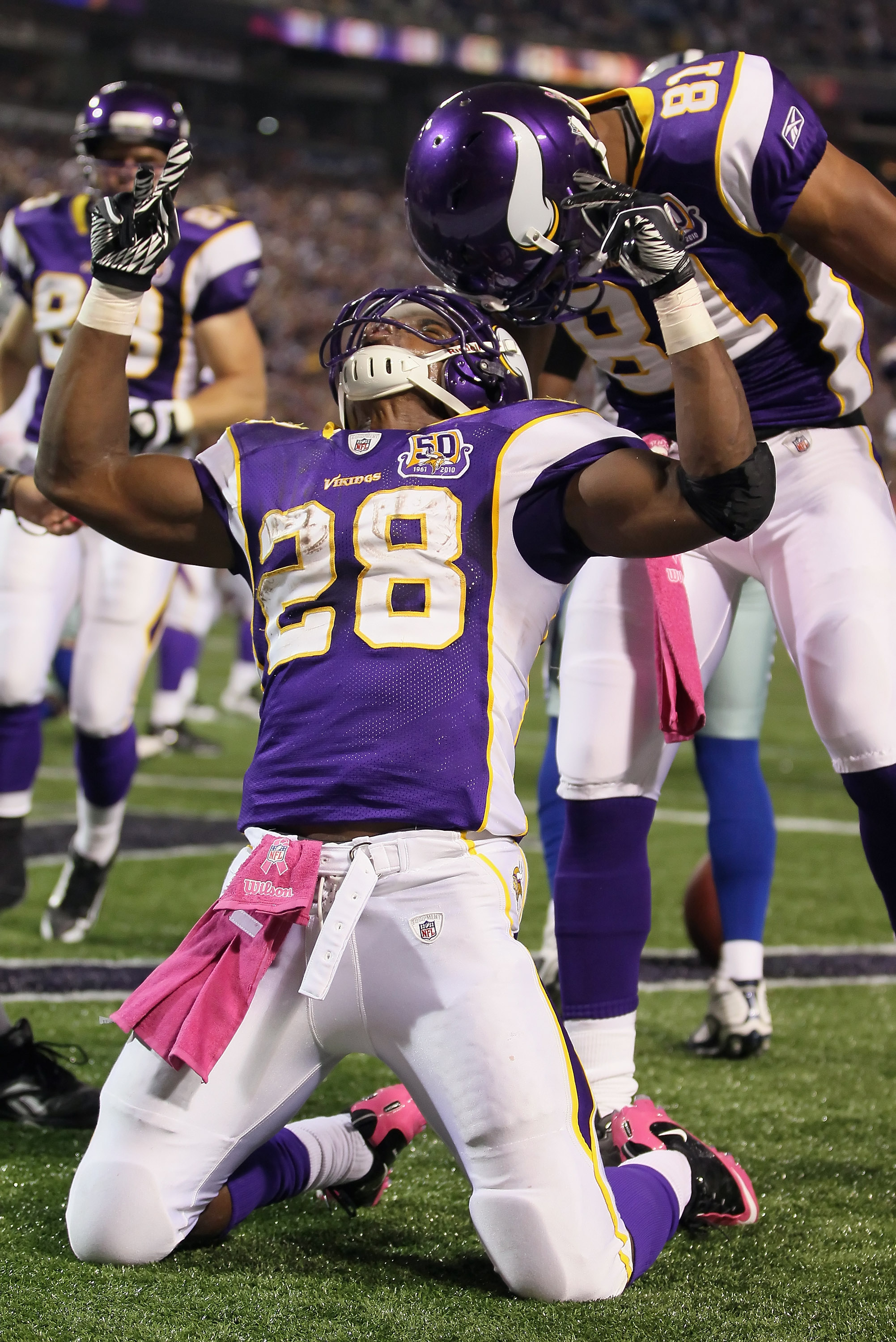 MINNEAPOLIS - OCTOBER 17:  Running back Adrian Peterson #29 of the Minnesota Vikings celebrates a touchdown against the Dallas Cowboys during the third quarter at Mall of America Field on October 17, 2010 in Minneapolis, Minnesota.  The Vikings defeated C