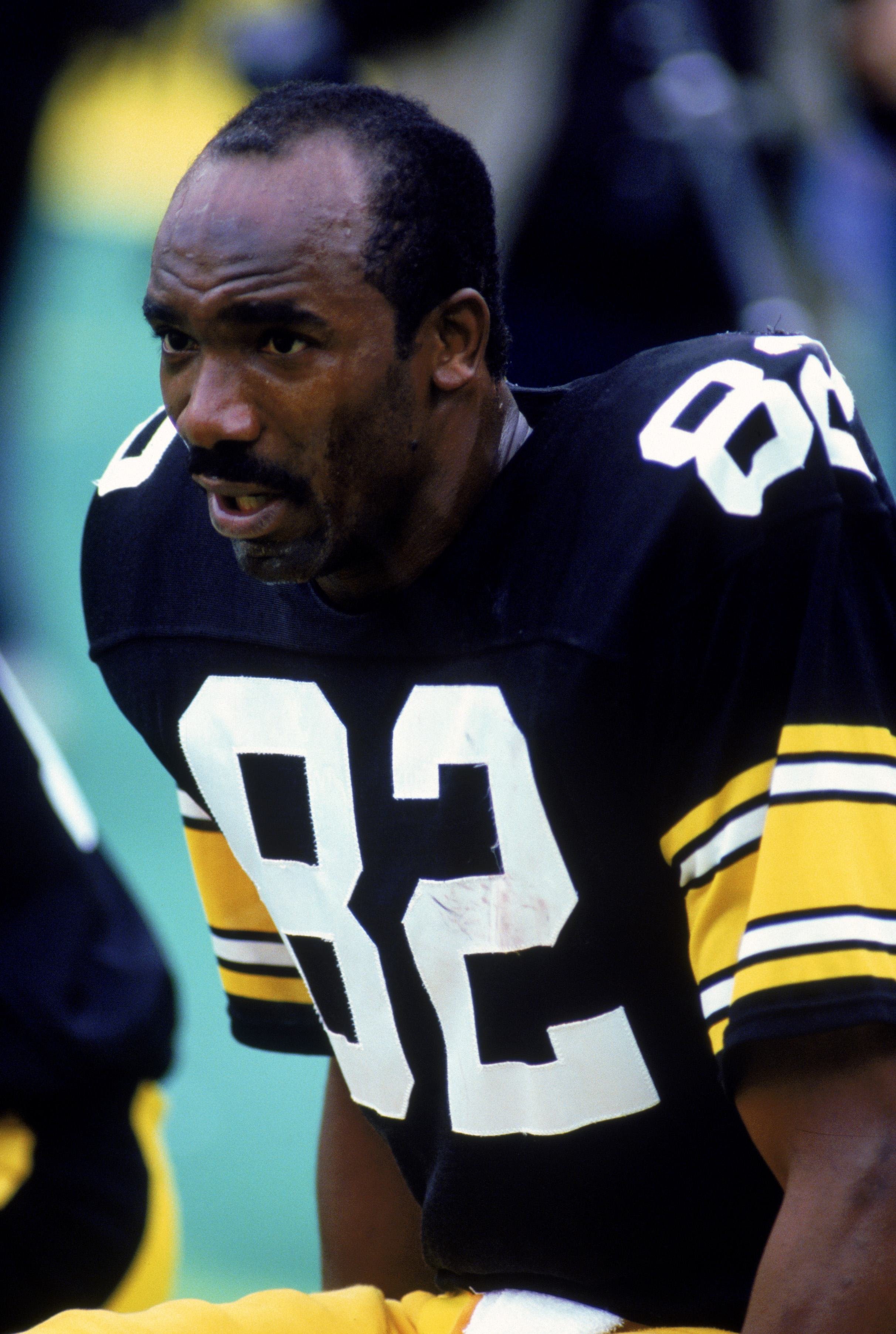 1984:  John Stallworth #82 of the Pittsburgh Steelers sits on the sideline during a 1984 NFL game.  (Jonathan Daniel/Getty Images)
