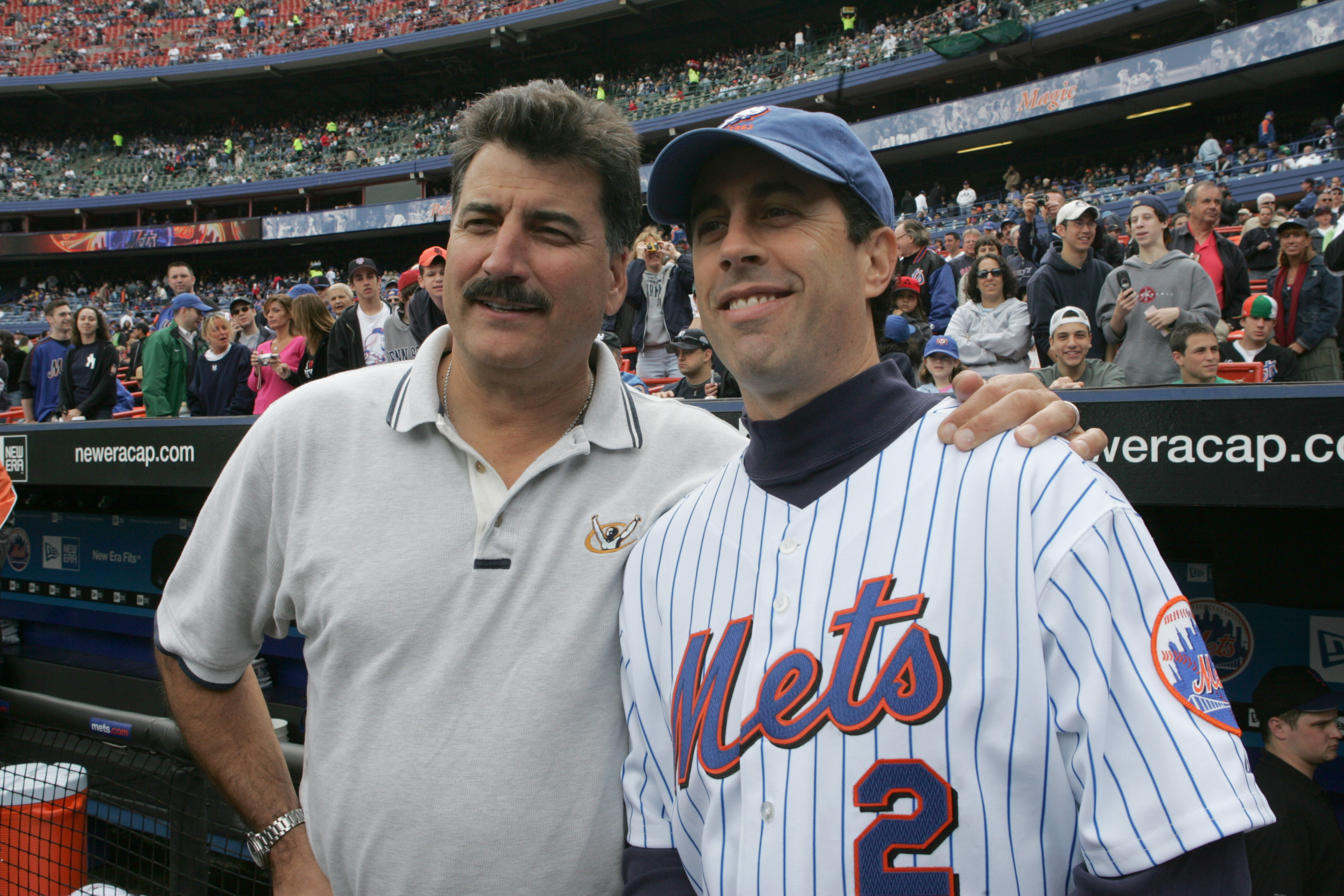FLUSHING, NY - MAY 22:  Former player Keith Hernandez (L) poses for a picture with comedian Jerry Seinfeld before the game between the New York Mets and the New York Yankees at Shea Stadium on May 22, 2005 in Flushing, New York. The Yankees defeated the M