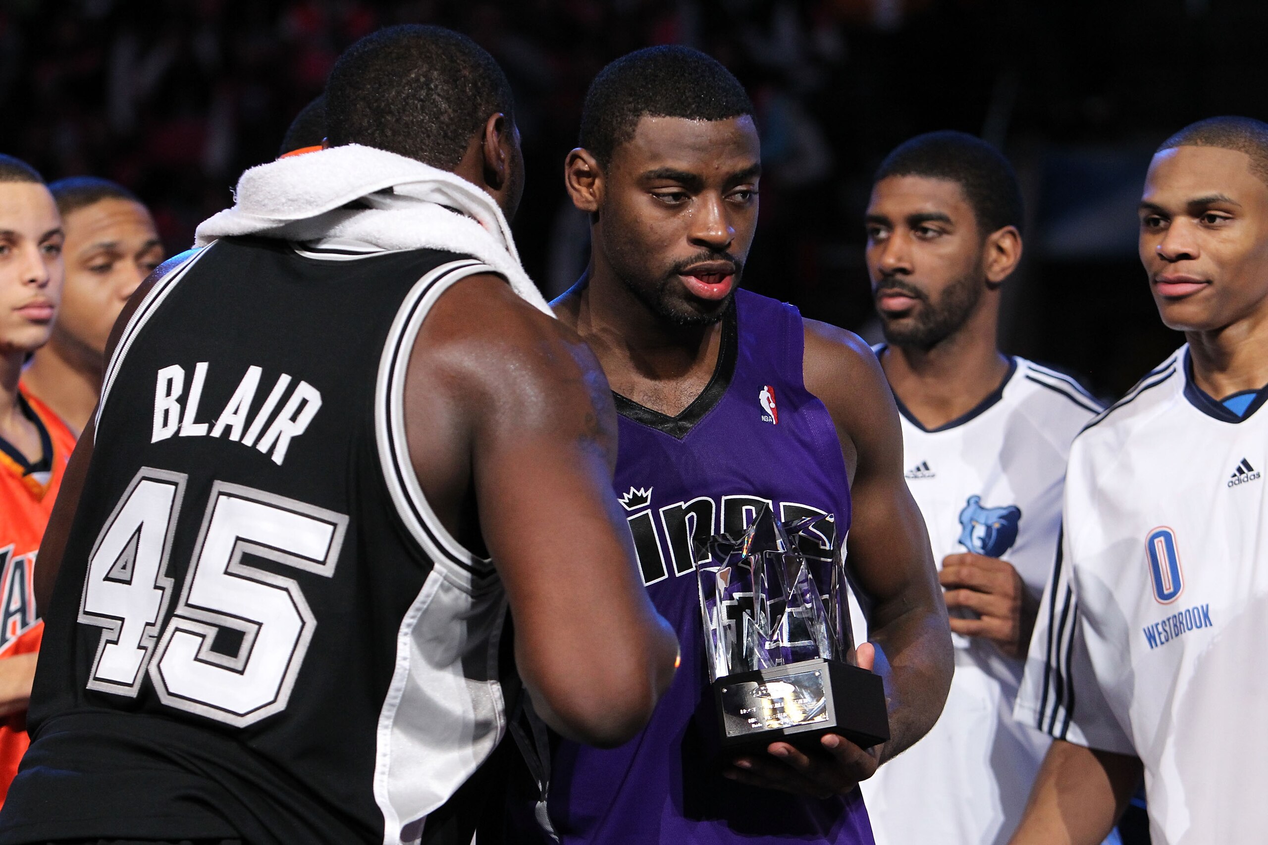 DALLAS - FEBRUARY 12:  DeJuan Blair #45 of the Rookie team congratulates teammate Tyreke Evans #13 on receiving the MVP trophy after defeating the Sophomore team during the second half of the T-Mobile Rookie Challenge & Youth Jam part of 2010 NBA All-Star