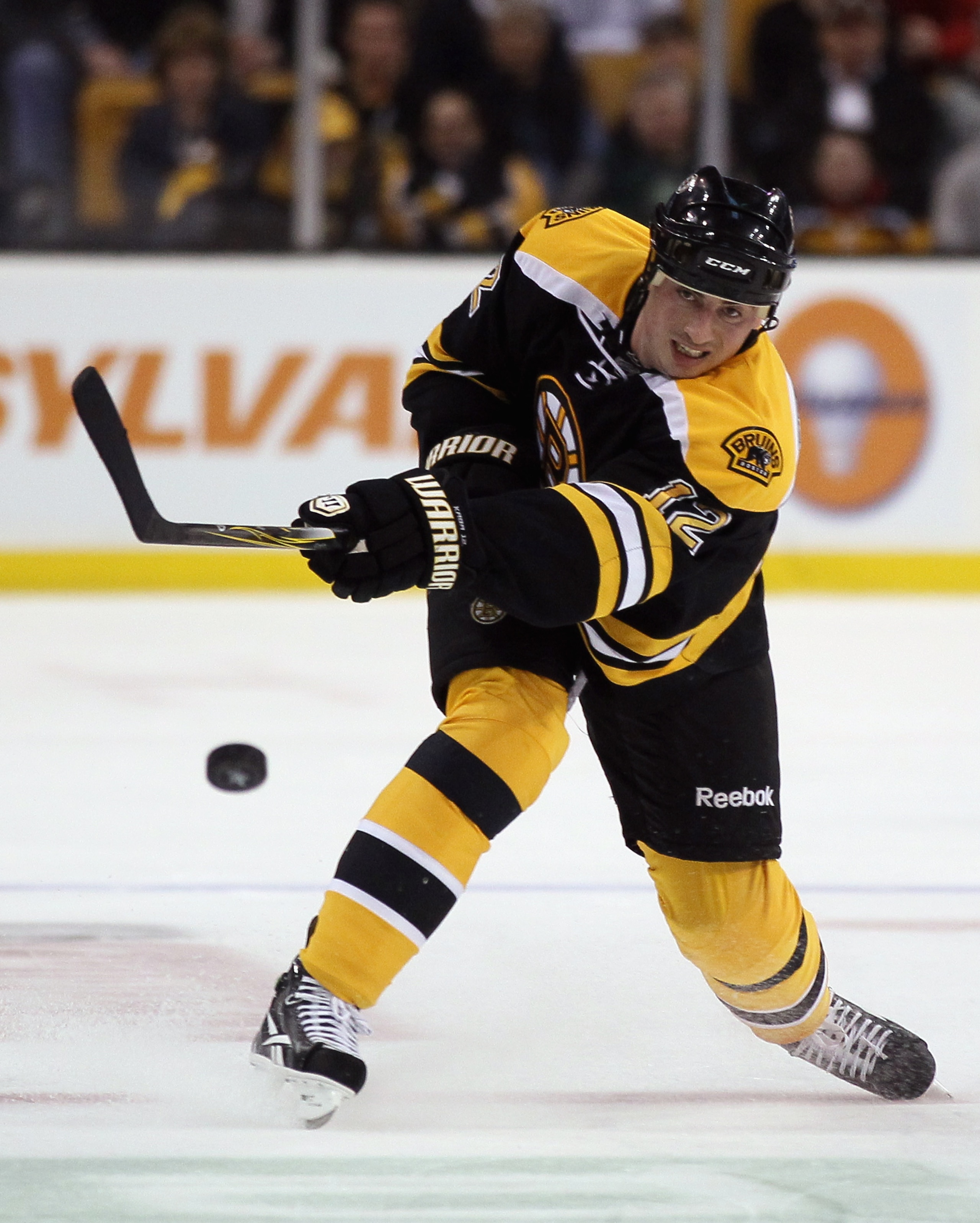 BOSTON, MA - APRIL 14:  Tomas Kaberle #12 of the Boston Bruins passes the puck in Game One of the Eastern Conference Quarterfinals during the 2011 NHL Stanley Cup Playoffs at TD Garden on April 14, 2011 in Boston, Massachusetts. The Montreal Canadiens def