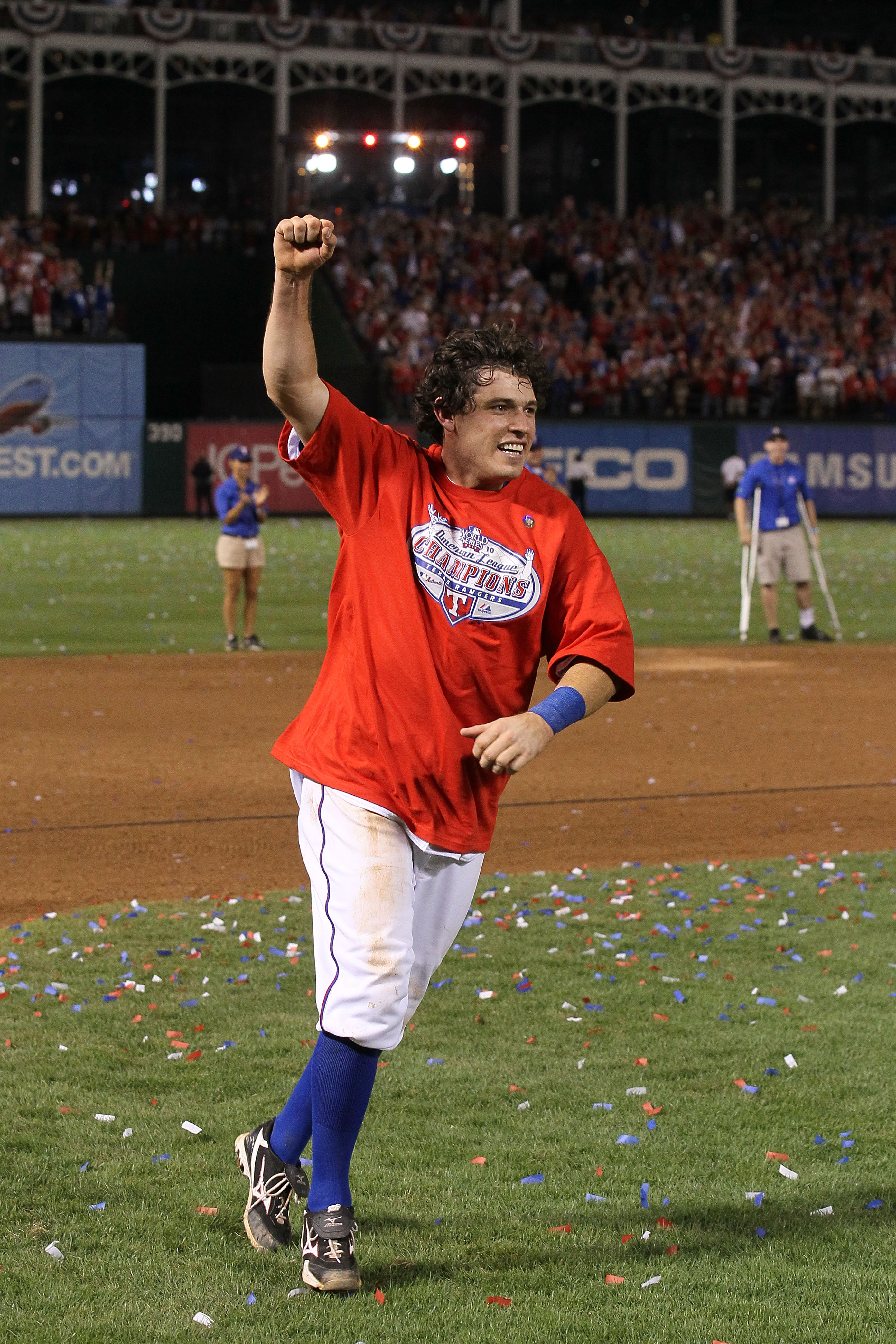 ARLINGTON, TX - OCTOBER 22:  Ian Kinsler #5 of the Texas Rangers celebrates on the field after defeating the New York Yankees 6-1 in Game Six of the ALCS to advance to the World Series during the 2010 MLB Playoffs at Rangers Ballpark in Arlington on Octob